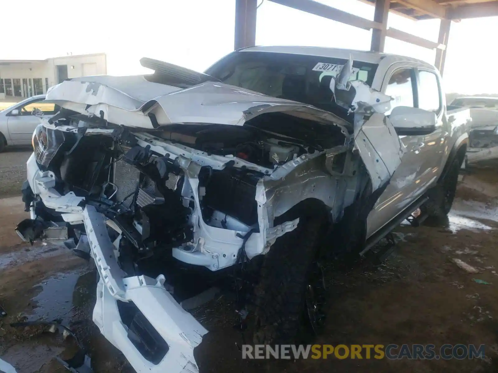 2 Photograph of a damaged car 5TFCZ5AN2KX203959 TOYOTA TACOMA 2019