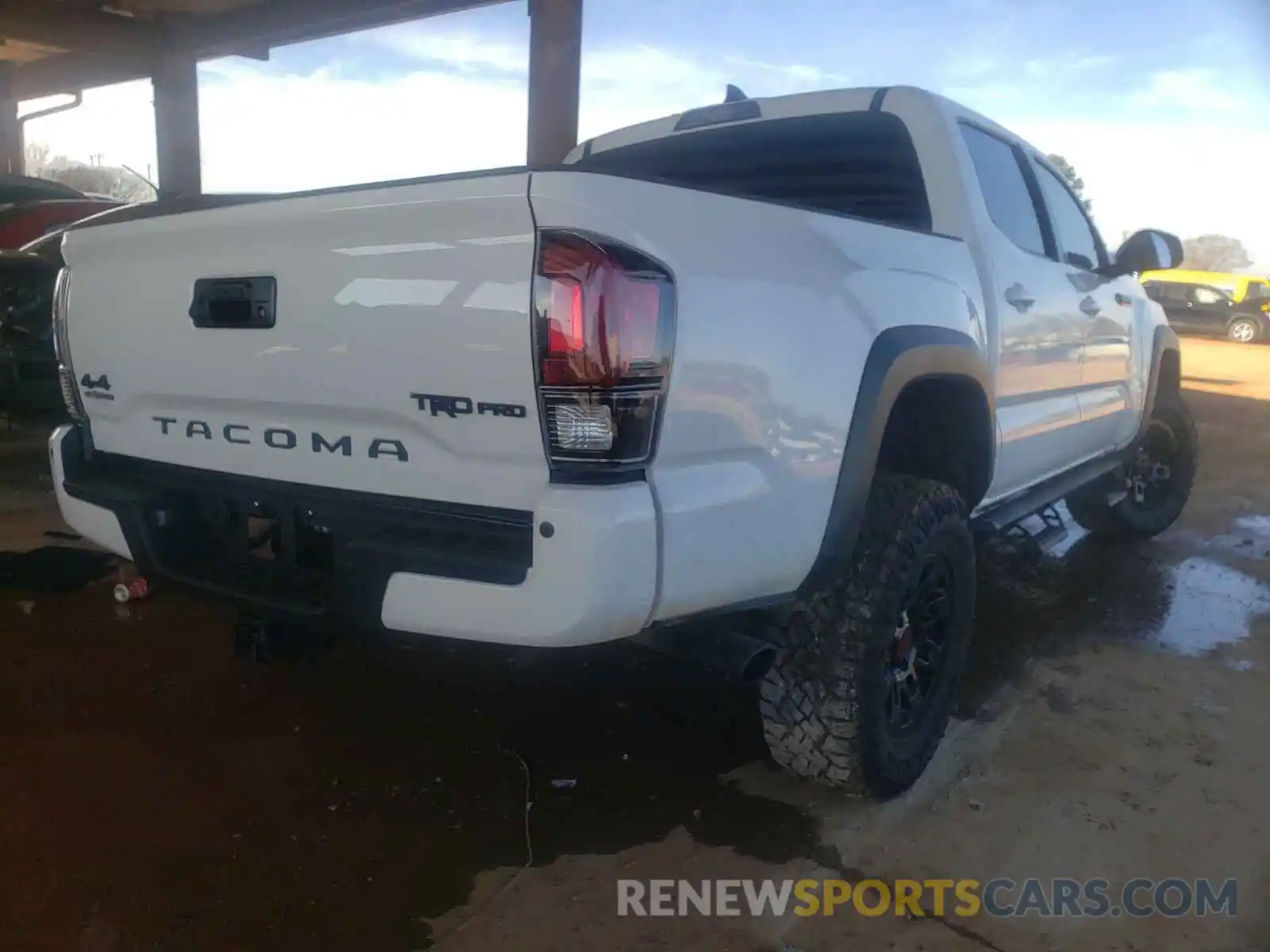 4 Photograph of a damaged car 5TFCZ5AN2KX203959 TOYOTA TACOMA 2019