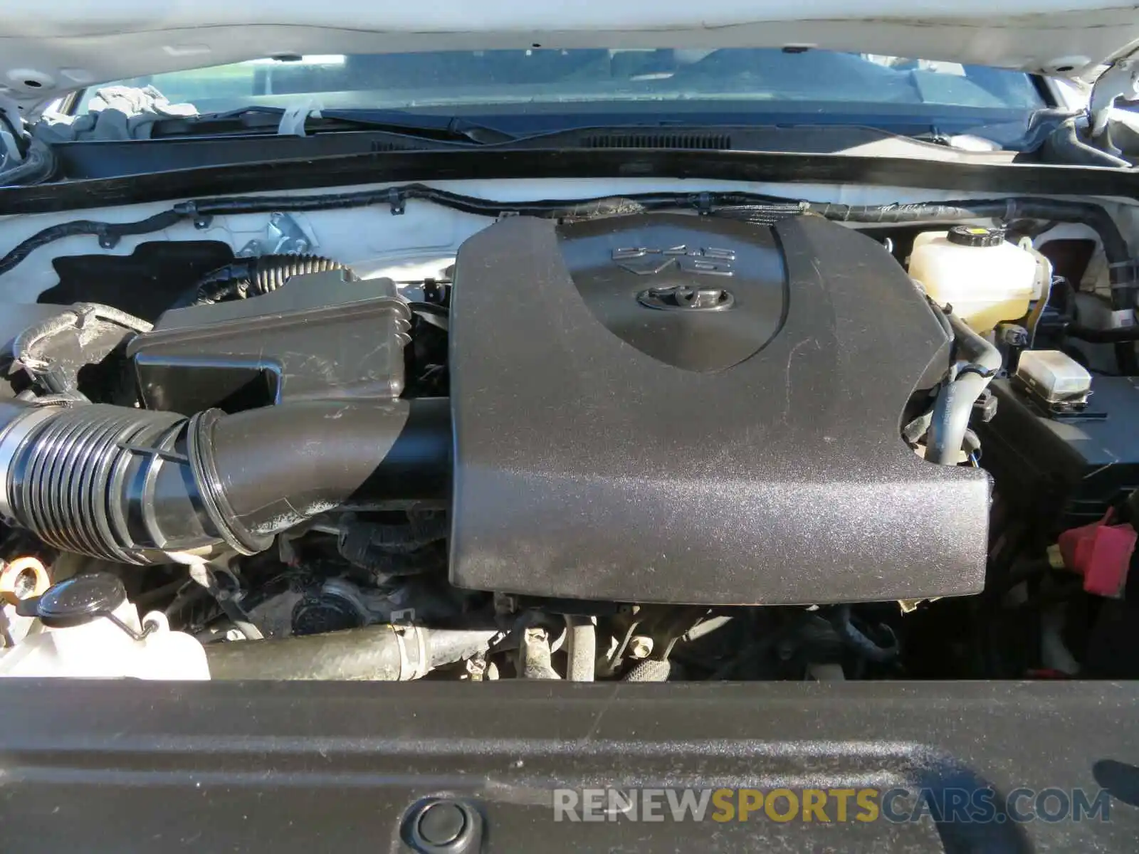 7 Photograph of a damaged car 5TFCZ5AN2KX211026 TOYOTA TACOMA 2019