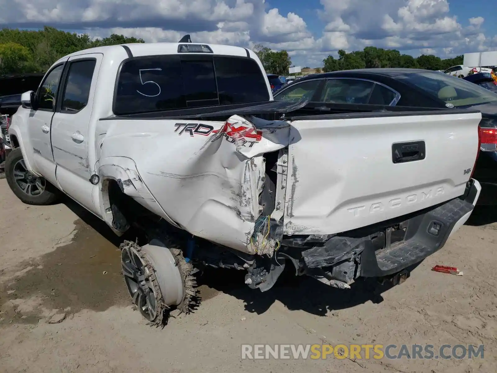 3 Photograph of a damaged car 5TFCZ5AN2KX211768 TOYOTA TACOMA 2019