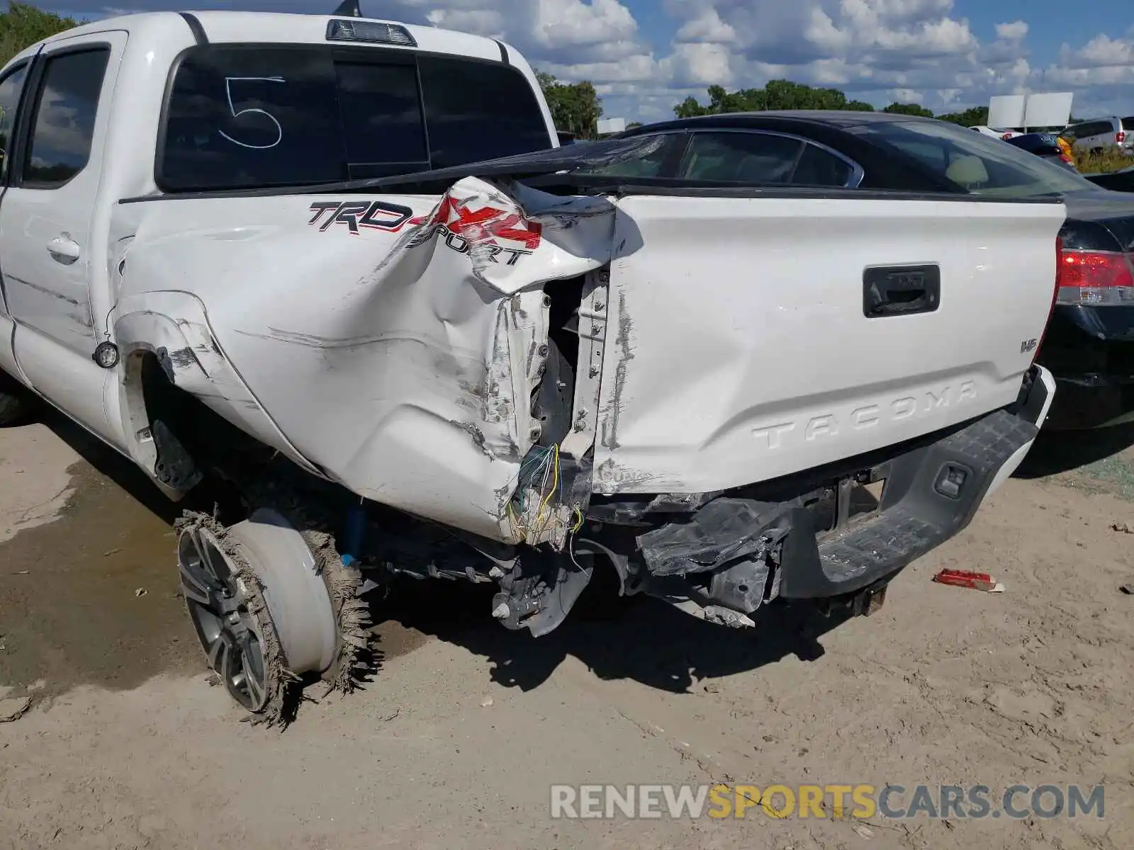 9 Photograph of a damaged car 5TFCZ5AN2KX211768 TOYOTA TACOMA 2019