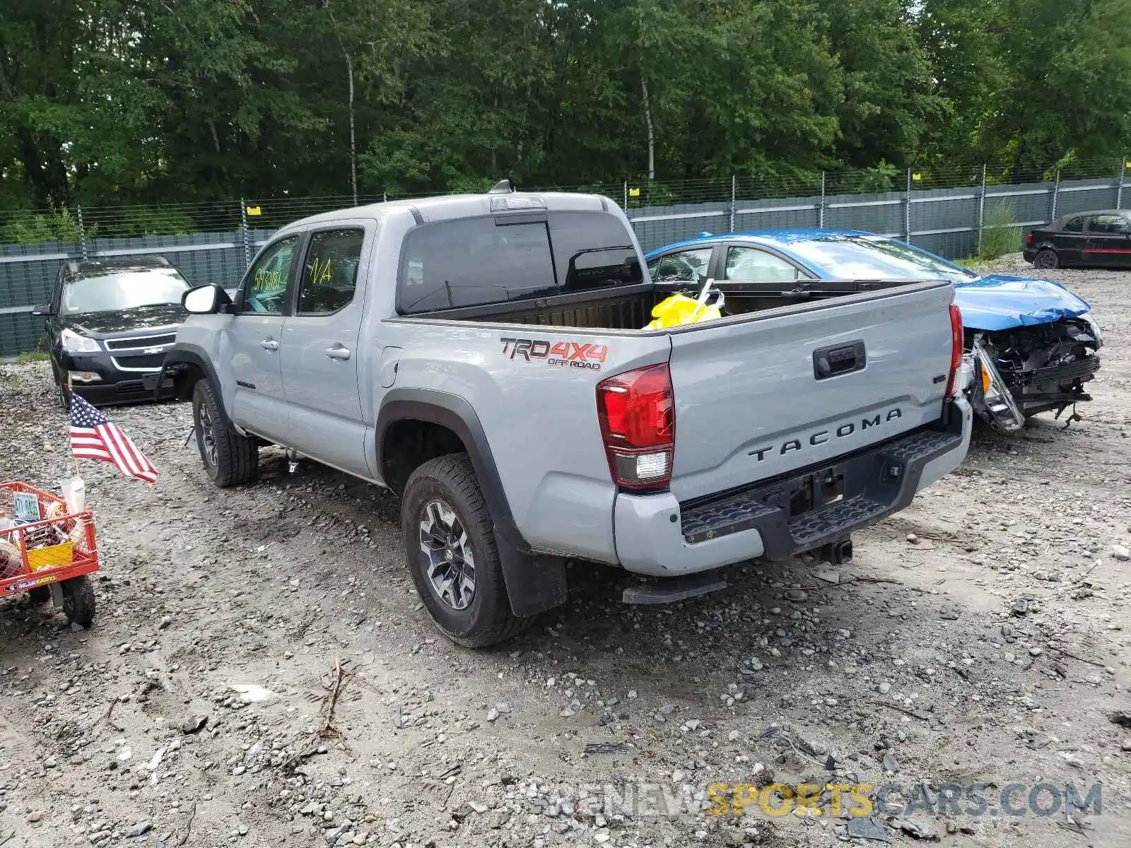 3 Photograph of a damaged car 5TFCZ5AN3KX165559 TOYOTA TACOMA 2019