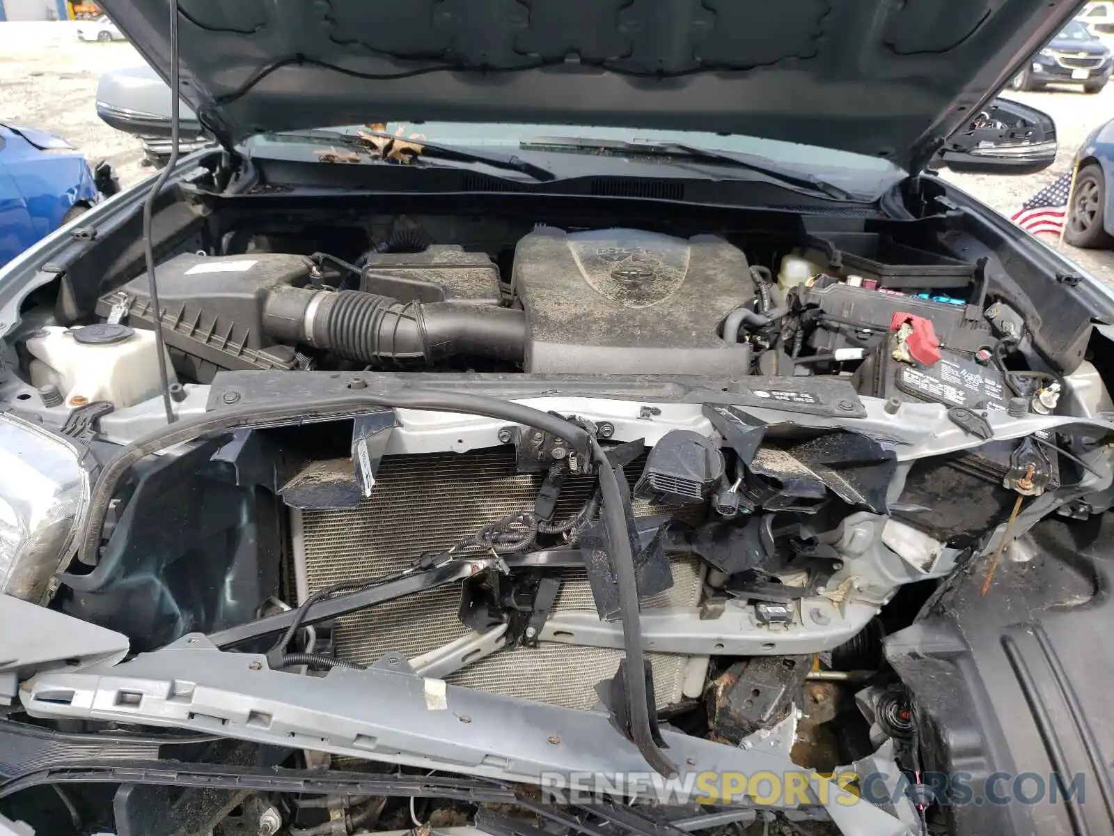 7 Photograph of a damaged car 5TFCZ5AN3KX165559 TOYOTA TACOMA 2019