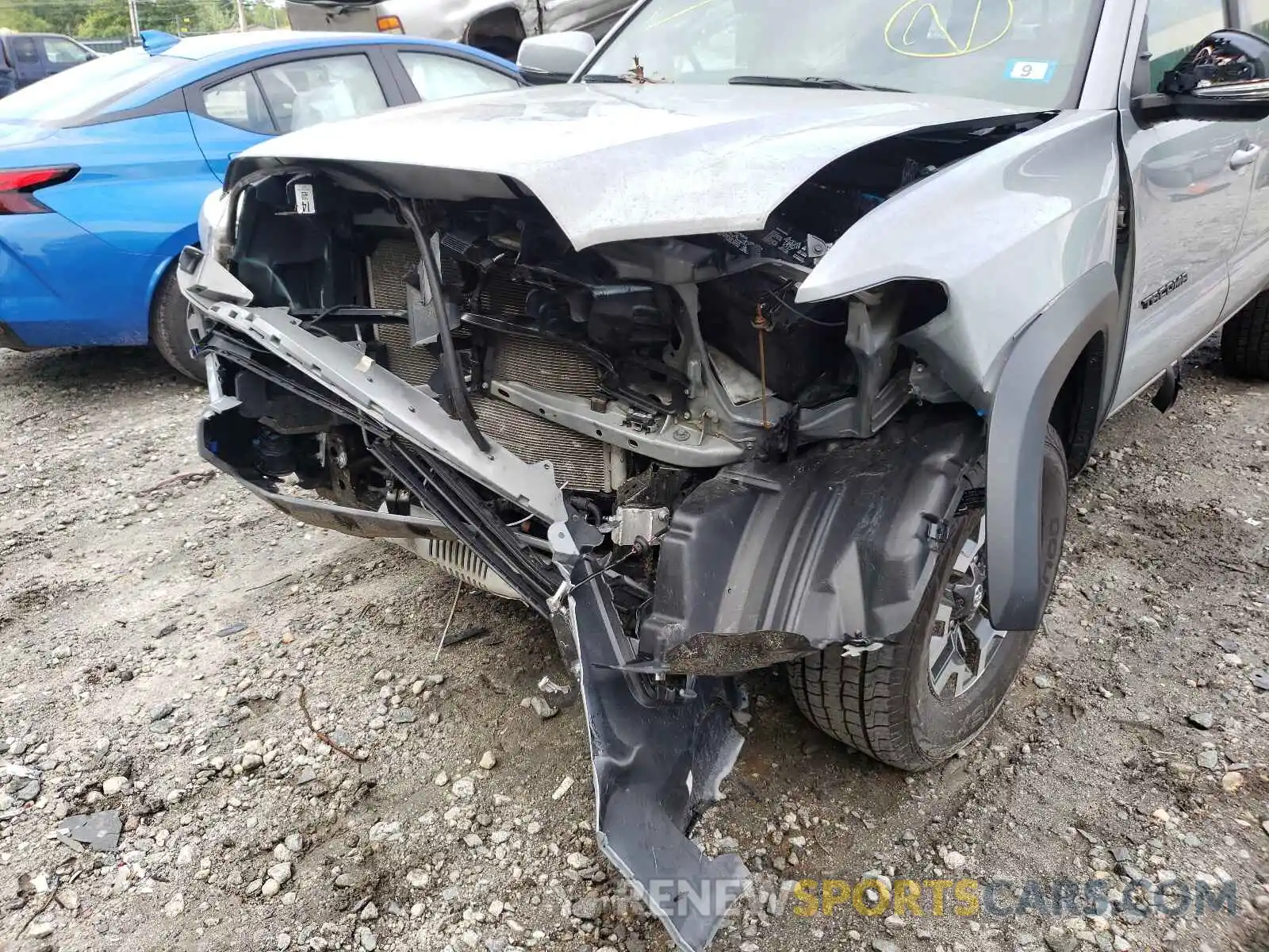 9 Photograph of a damaged car 5TFCZ5AN3KX165559 TOYOTA TACOMA 2019