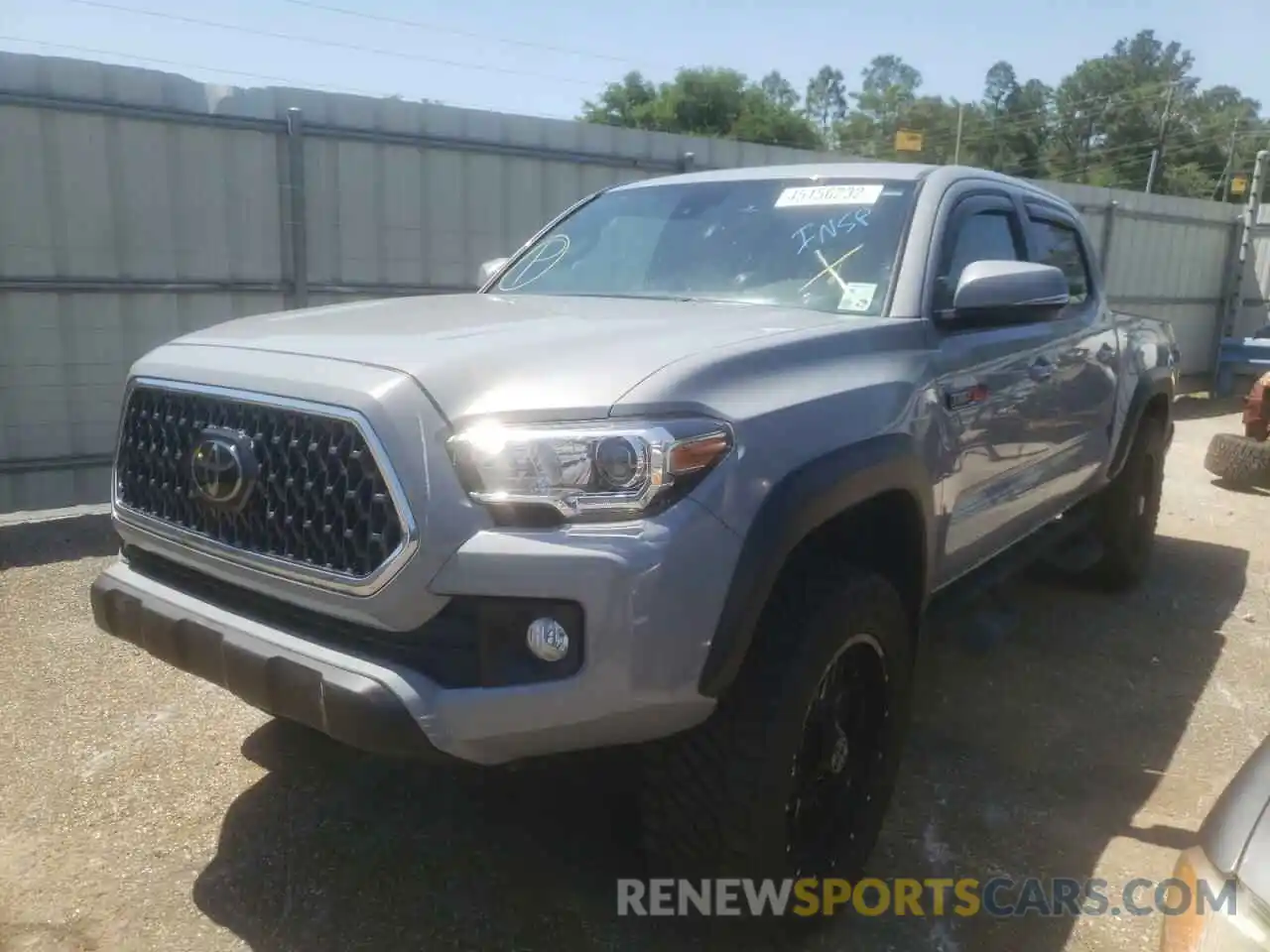 2 Photograph of a damaged car 5TFCZ5AN3KX165898 TOYOTA TACOMA 2019