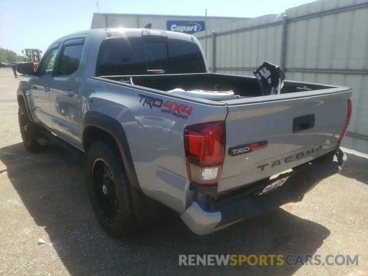 3 Photograph of a damaged car 5TFCZ5AN3KX165898 TOYOTA TACOMA 2019