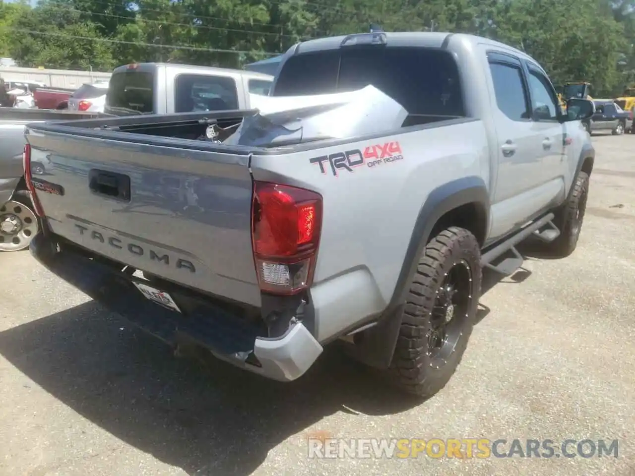 4 Фотография поврежденного автомобиля 5TFCZ5AN3KX165898 TOYOTA TACOMA 2019