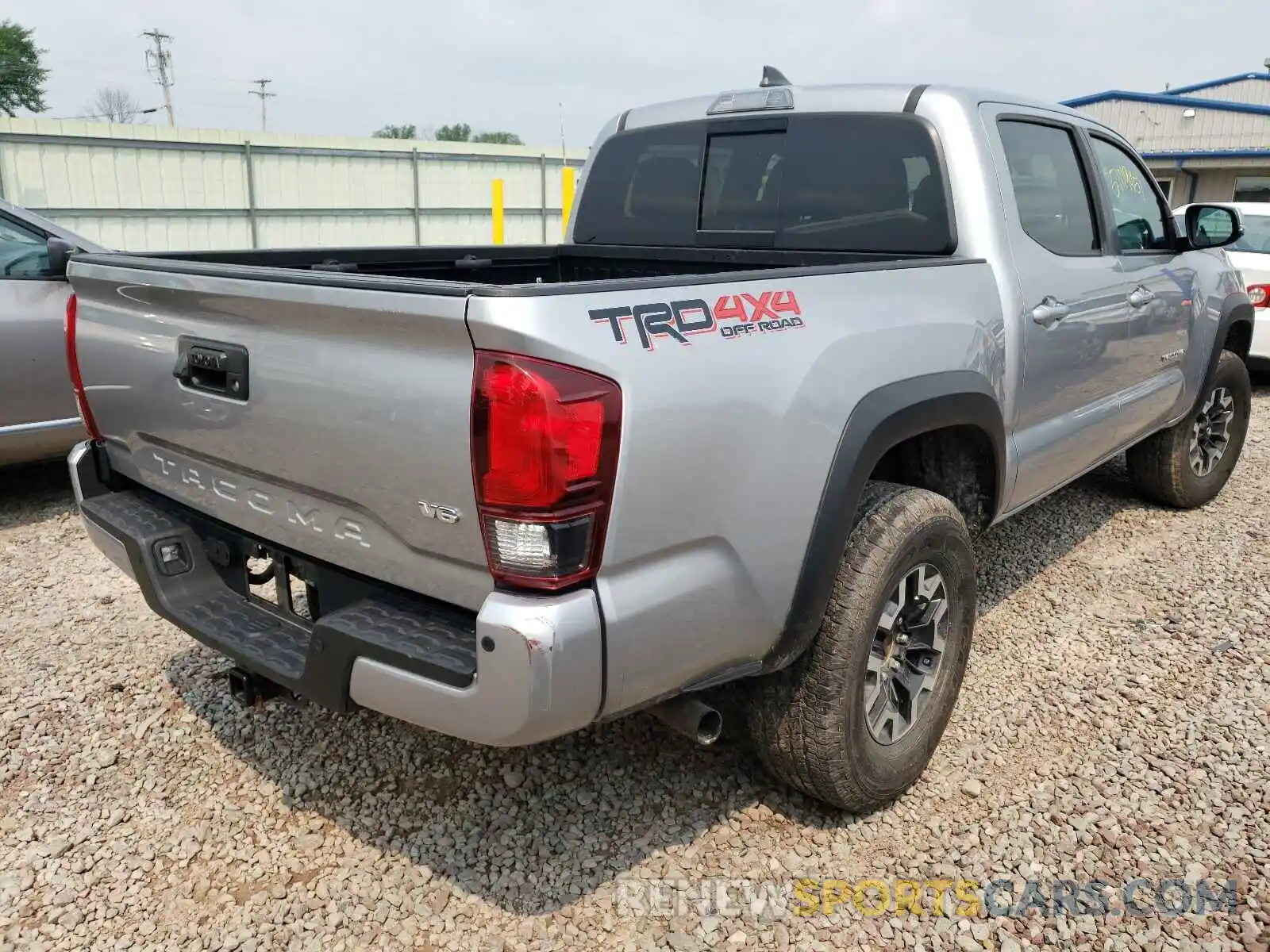 4 Photograph of a damaged car 5TFCZ5AN3KX171913 TOYOTA TACOMA 2019