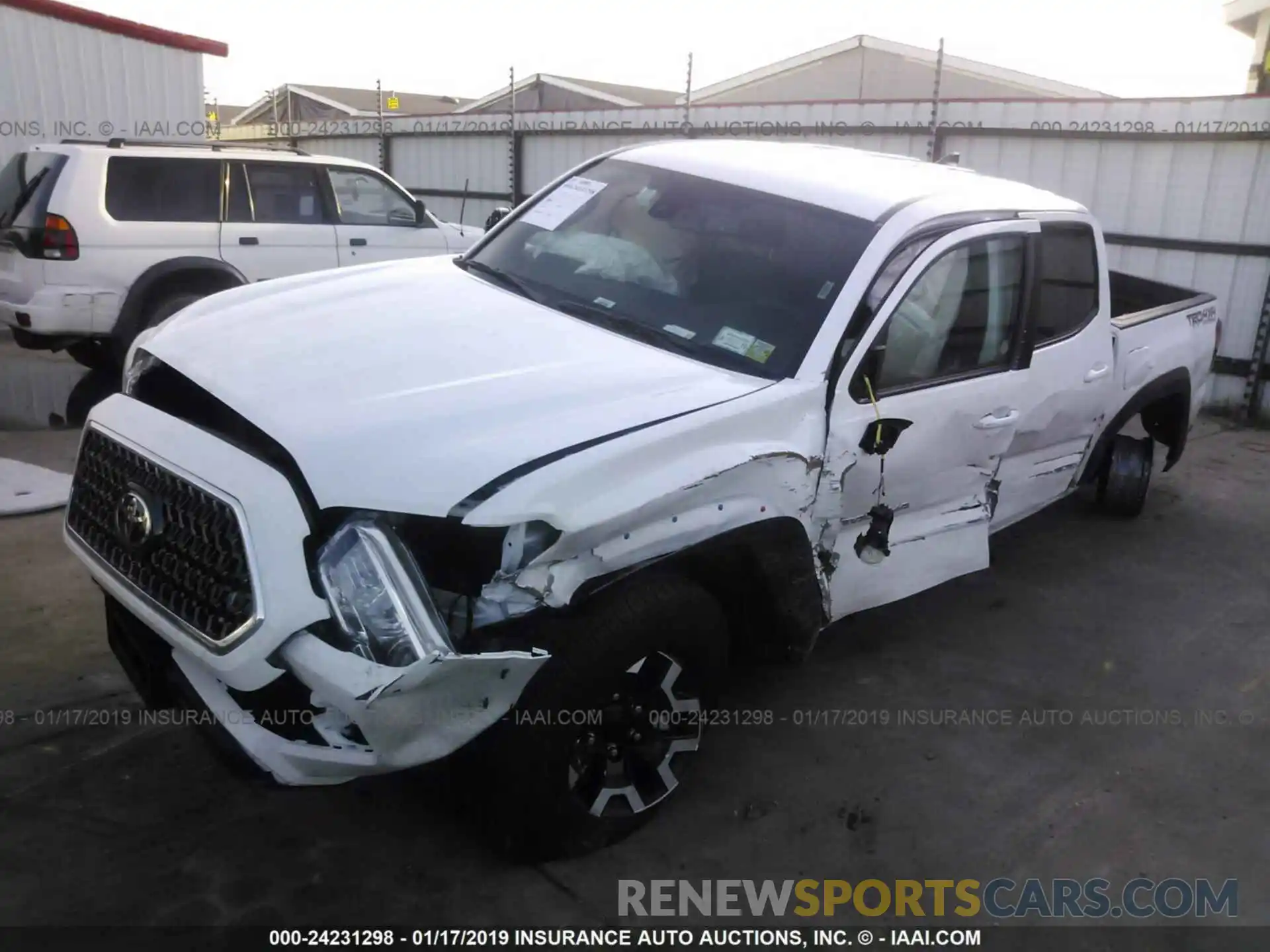 2 Photograph of a damaged car 5TFCZ5AN3KX172611 TOYOTA TACOMA 2019