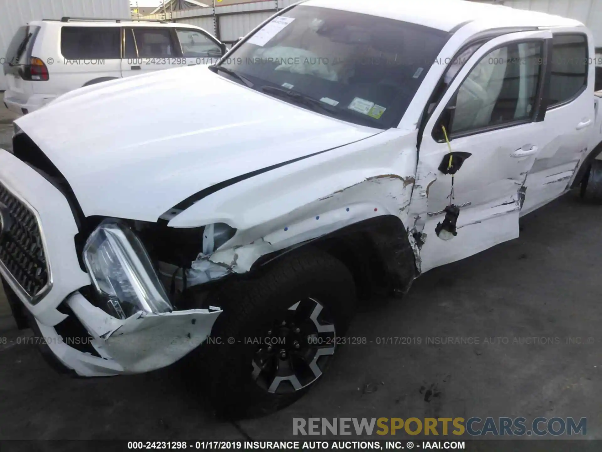 6 Photograph of a damaged car 5TFCZ5AN3KX172611 TOYOTA TACOMA 2019