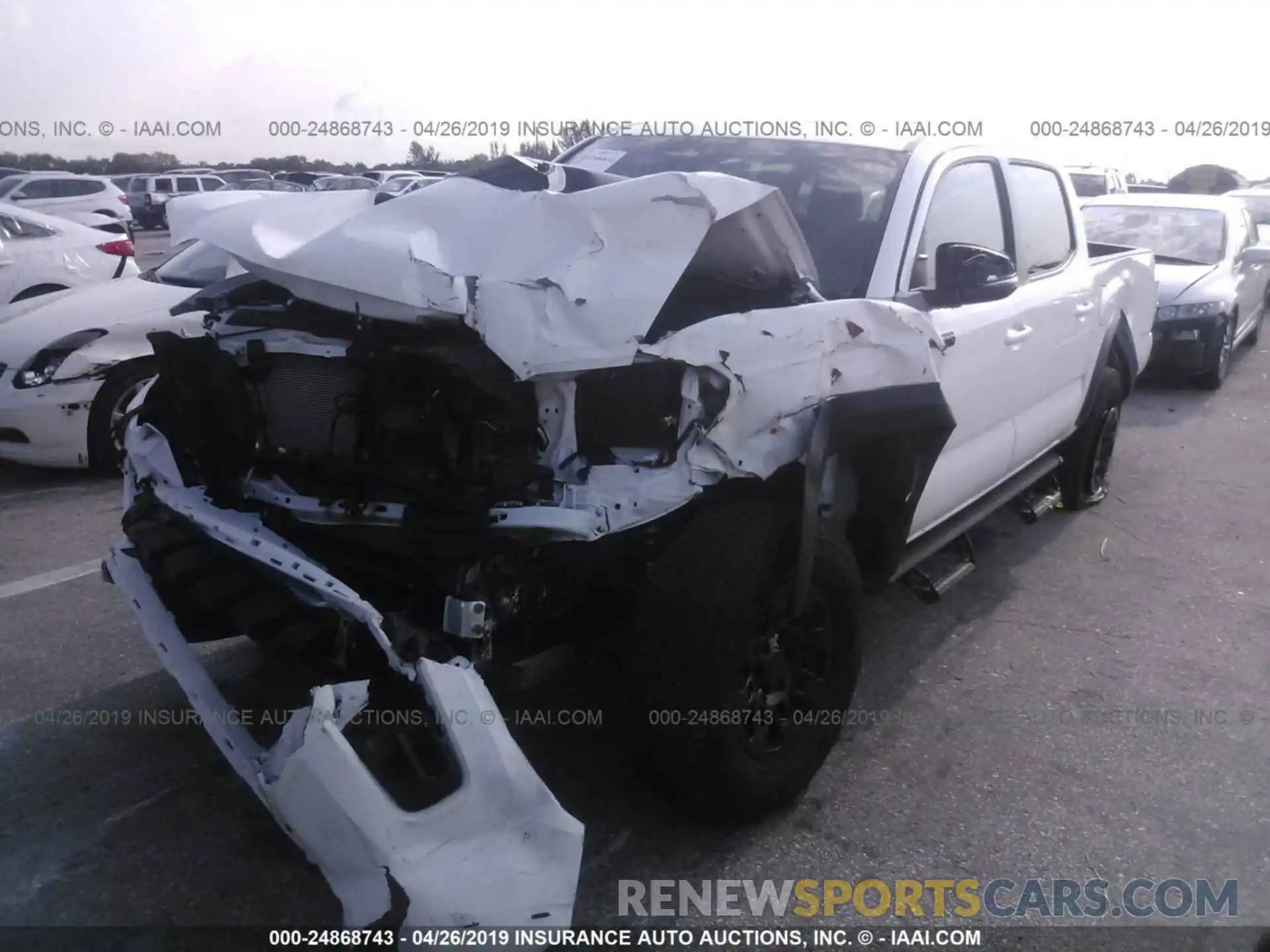 2 Photograph of a damaged car 5TFCZ5AN3KX173791 TOYOTA TACOMA 2019