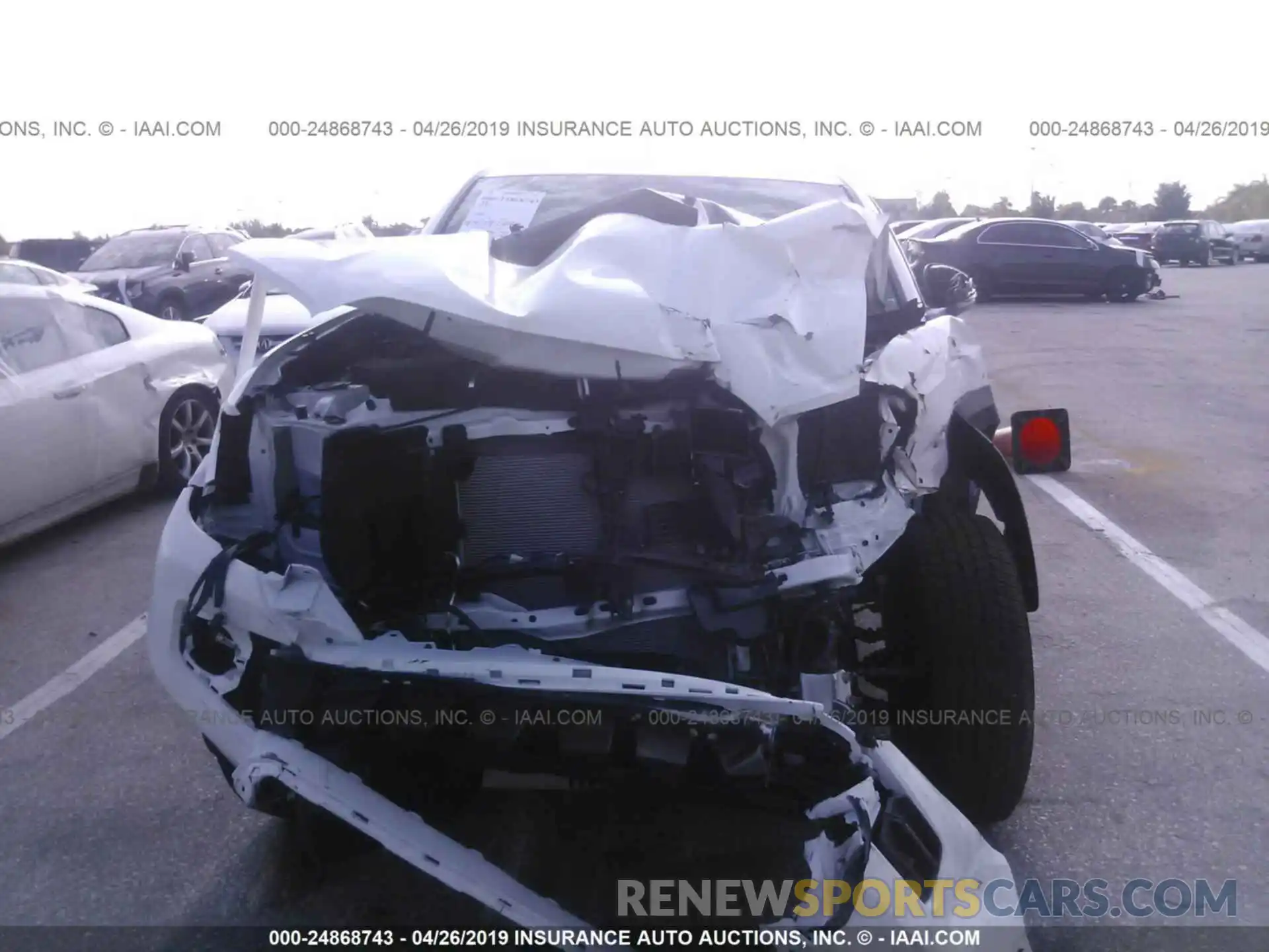 6 Photograph of a damaged car 5TFCZ5AN3KX173791 TOYOTA TACOMA 2019