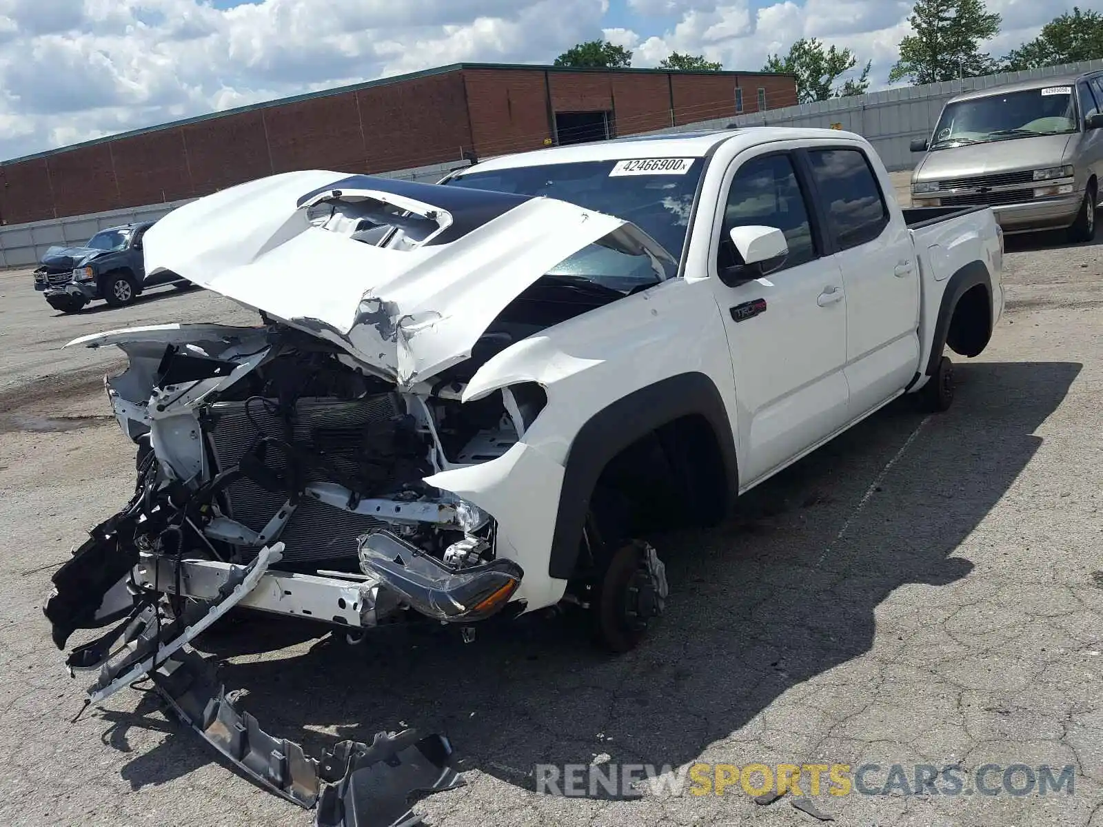 2 Photograph of a damaged car 5TFCZ5AN3KX175458 TOYOTA TACOMA 2019