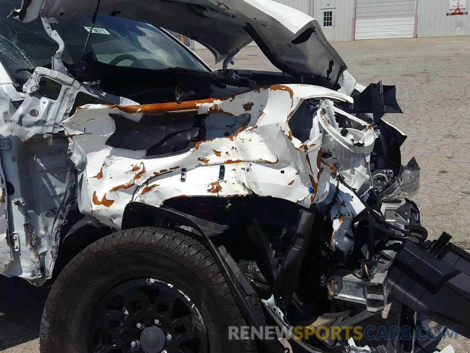 9 Photograph of a damaged car 5TFCZ5AN3KX175458 TOYOTA TACOMA 2019