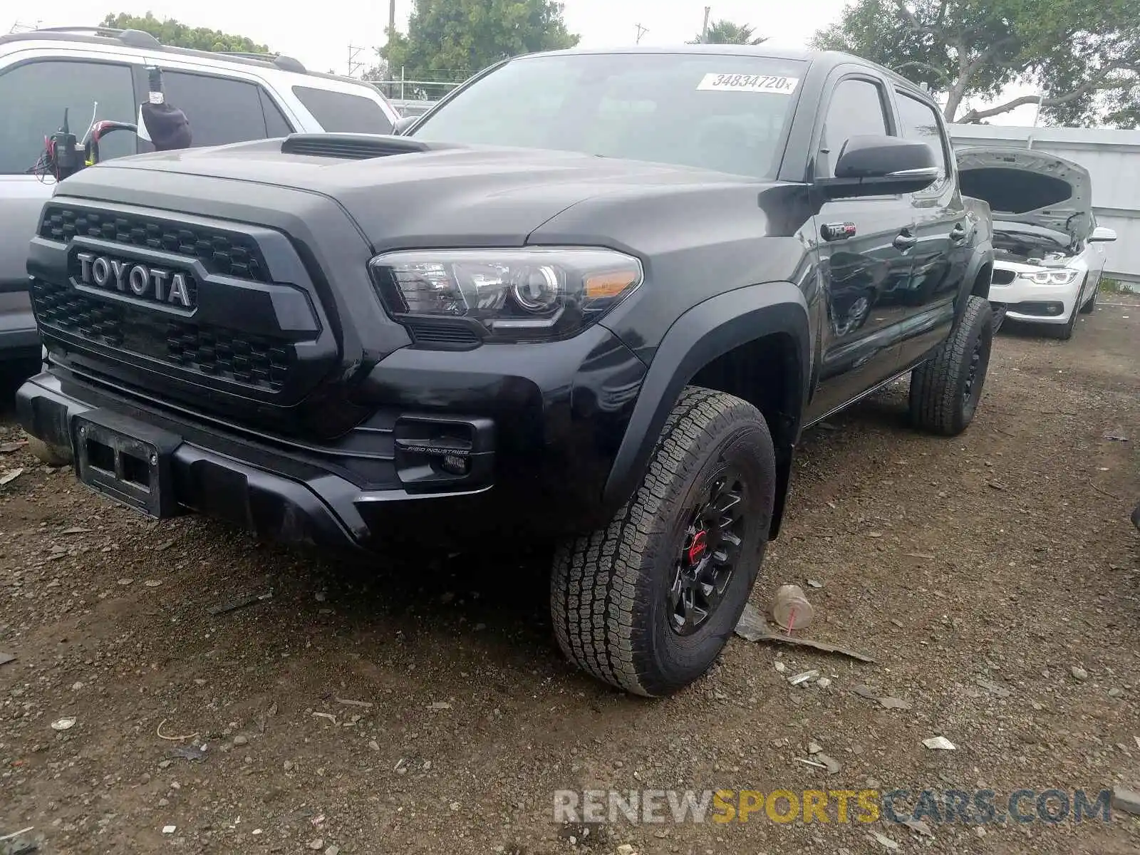 2 Photograph of a damaged car 5TFCZ5AN3KX176481 TOYOTA TACOMA 2019