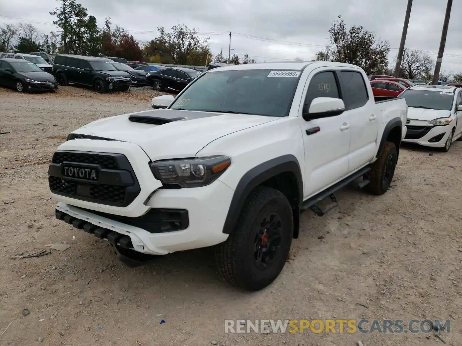 2 Photograph of a damaged car 5TFCZ5AN3KX179252 TOYOTA TACOMA 2019