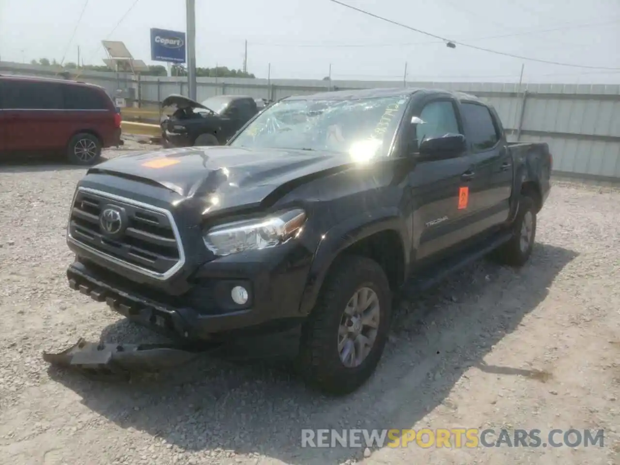 2 Photograph of a damaged car 5TFCZ5AN3KX180191 TOYOTA TACOMA 2019