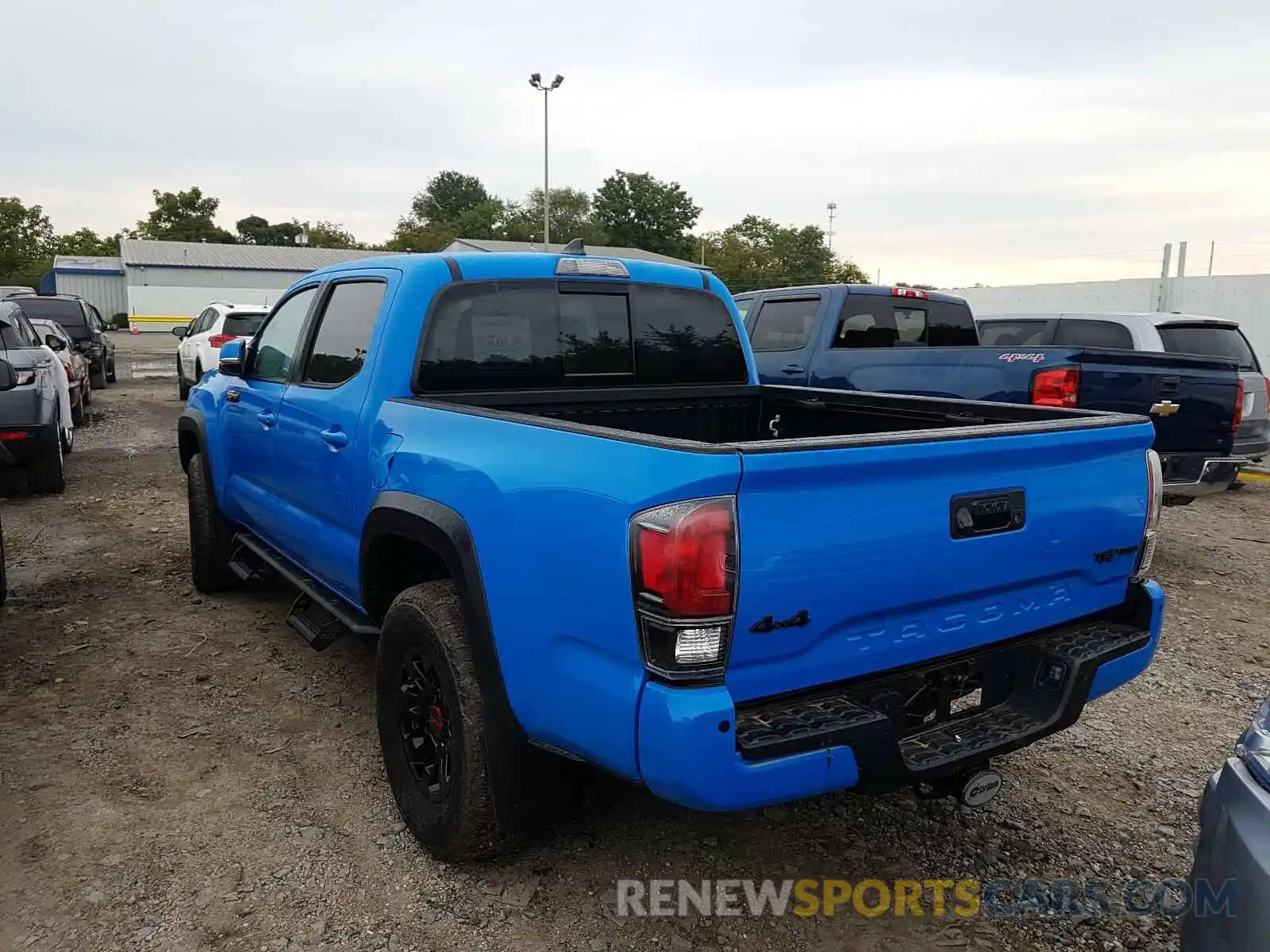 3 Photograph of a damaged car 5TFCZ5AN3KX182992 TOYOTA TACOMA 2019