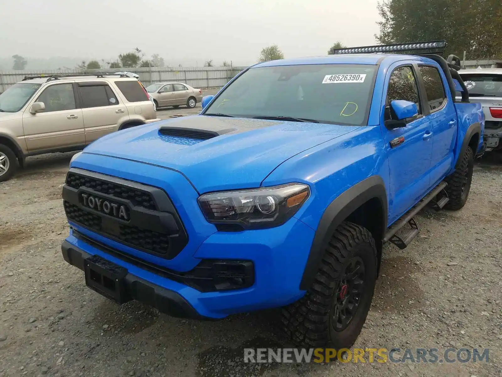 2 Photograph of a damaged car 5TFCZ5AN3KX186847 TOYOTA TACOMA 2019