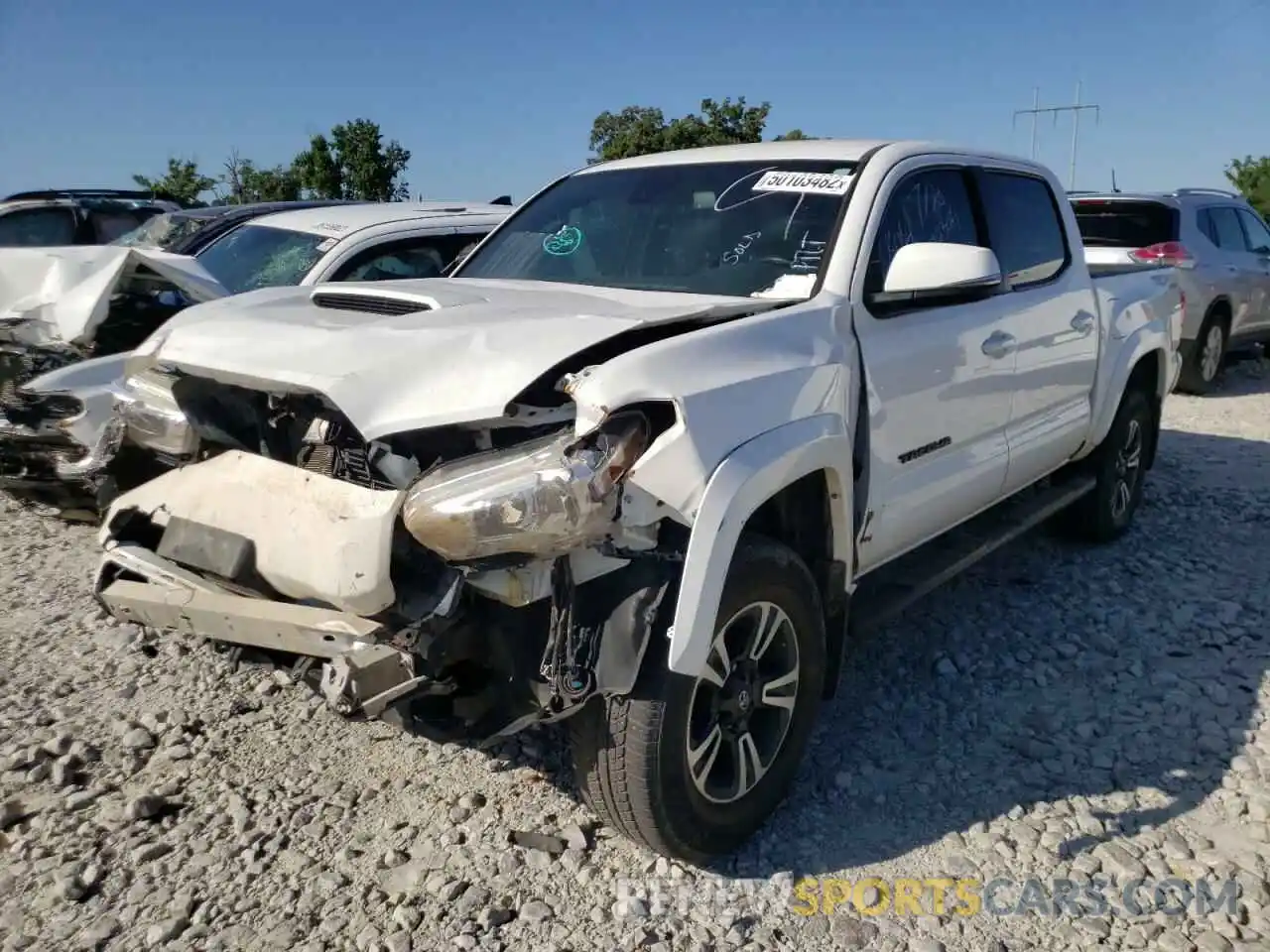 2 Photograph of a damaged car 5TFCZ5AN3KX189554 TOYOTA TACOMA 2019