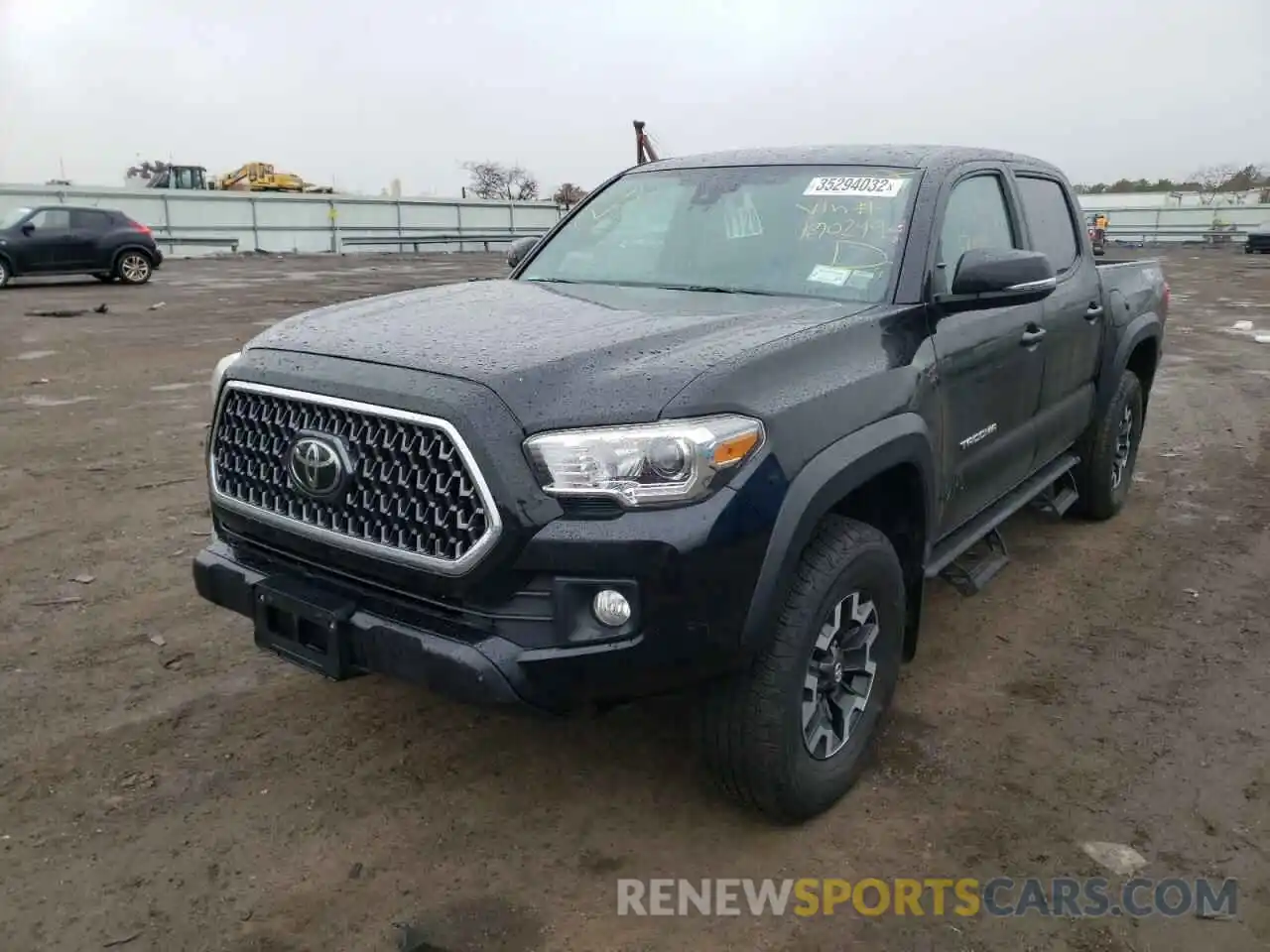 2 Photograph of a damaged car 5TFCZ5AN3KX190249 TOYOTA TACOMA 2019