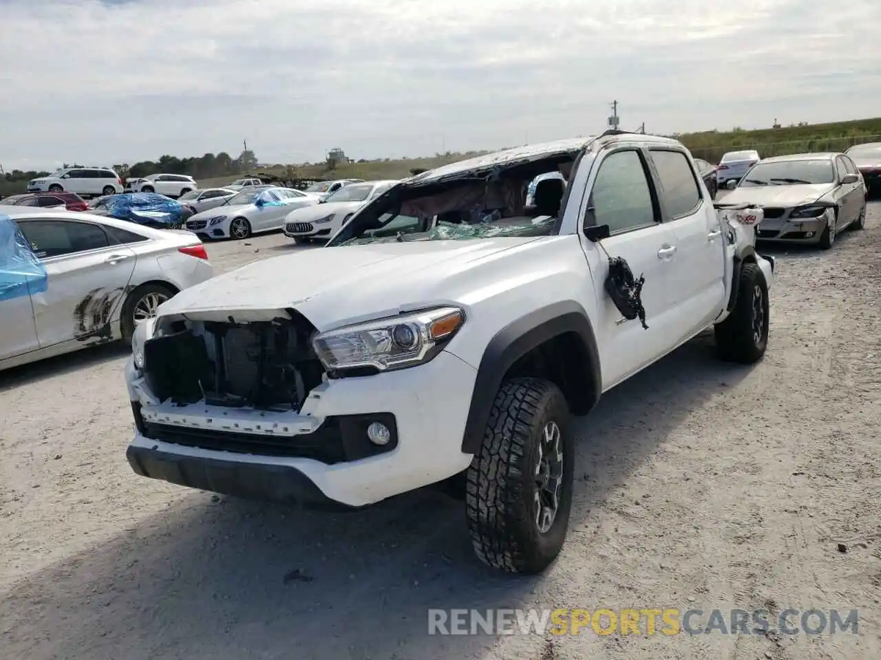 2 Photograph of a damaged car 5TFCZ5AN3KX190686 TOYOTA TACOMA 2019