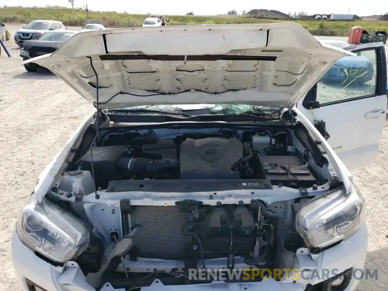 7 Photograph of a damaged car 5TFCZ5AN3KX190686 TOYOTA TACOMA 2019