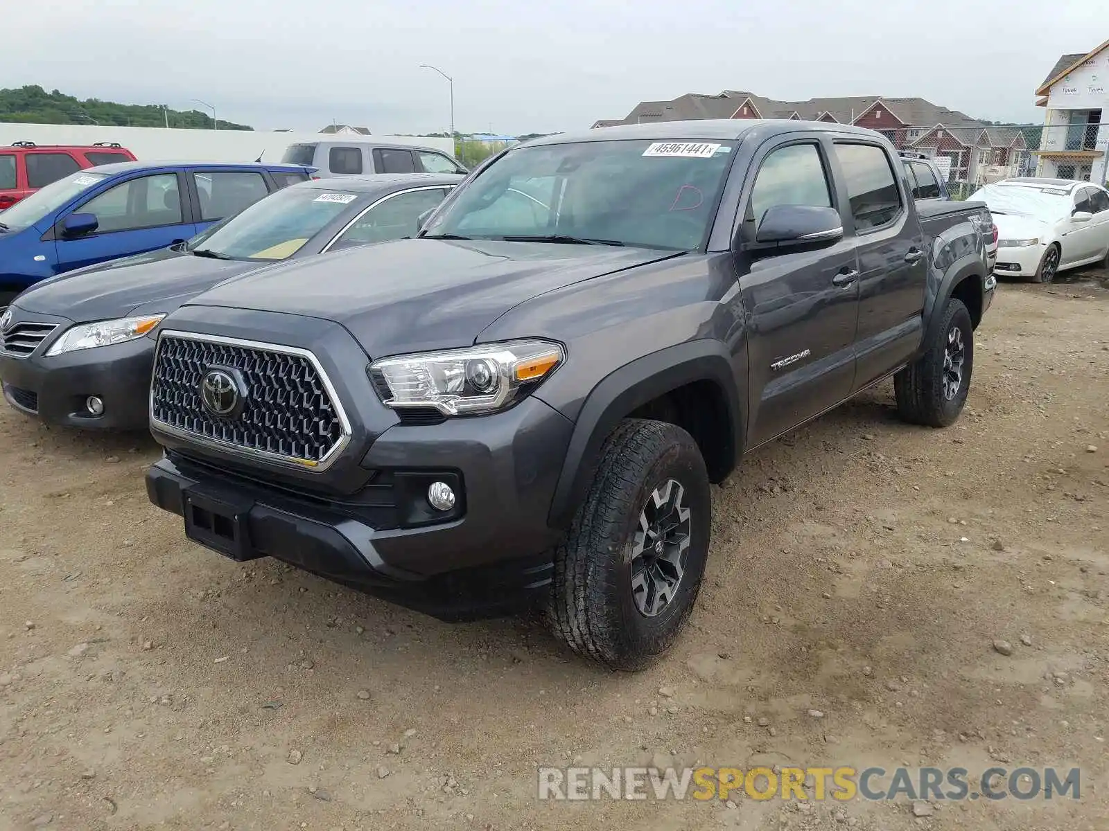 2 Photograph of a damaged car 5TFCZ5AN3KX190963 TOYOTA TACOMA 2019