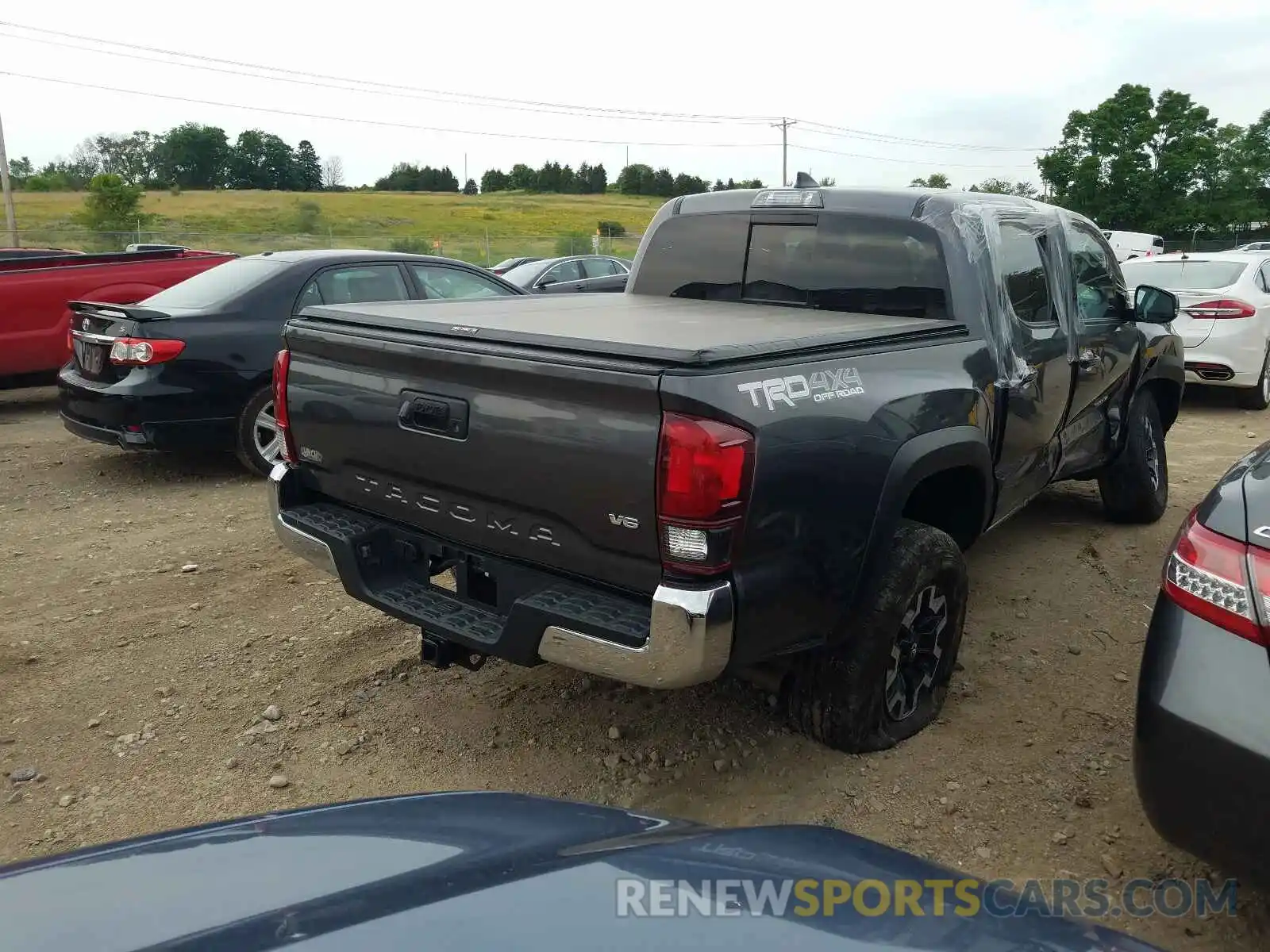 4 Photograph of a damaged car 5TFCZ5AN3KX190963 TOYOTA TACOMA 2019