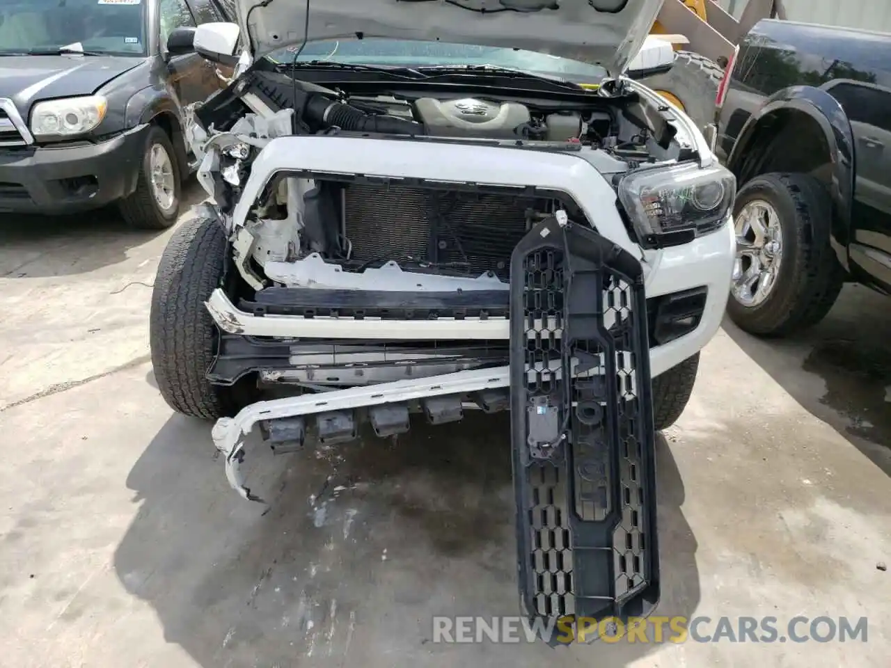 7 Photograph of a damaged car 5TFCZ5AN3KX191367 TOYOTA TACOMA 2019