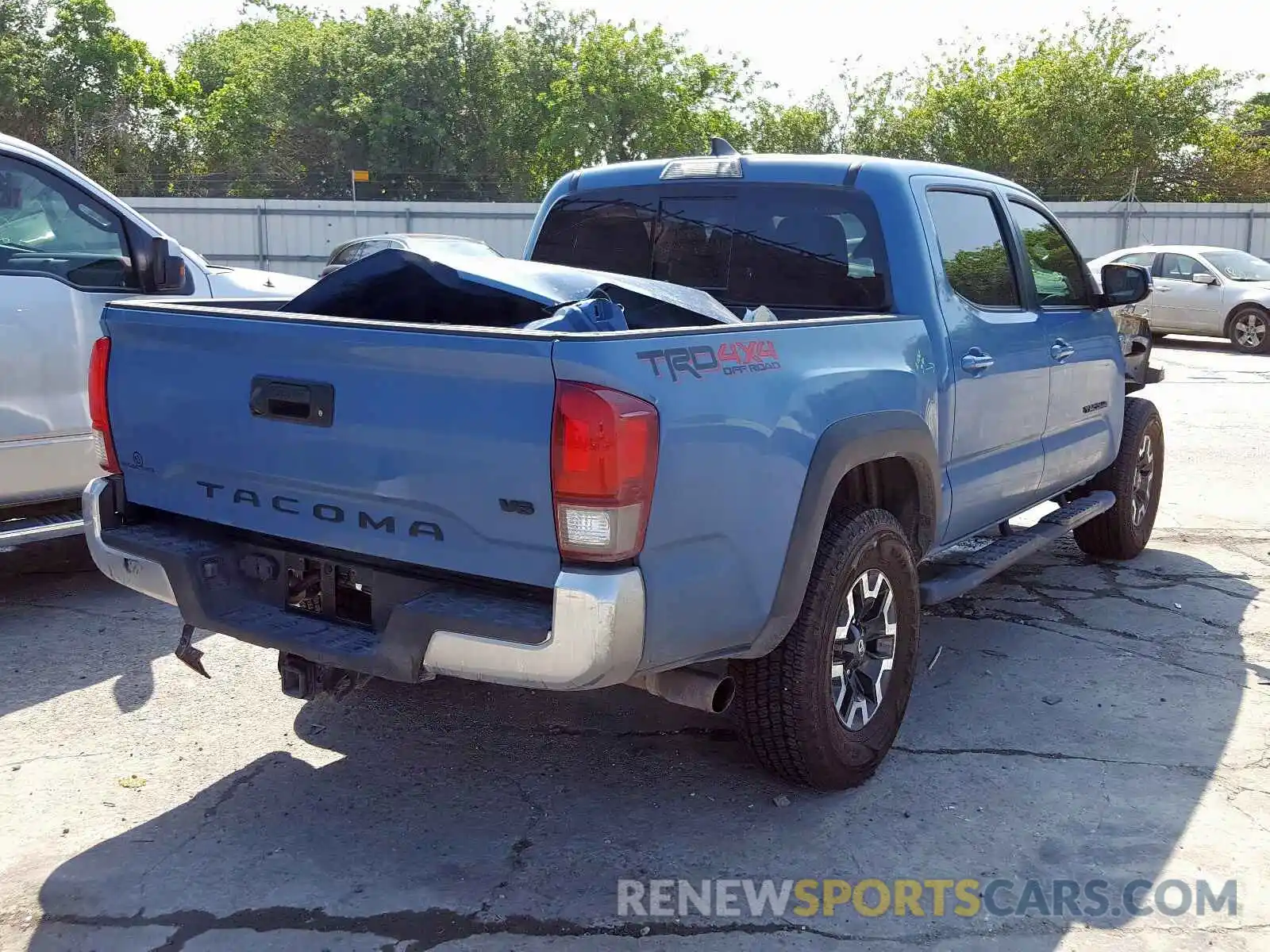 4 Photograph of a damaged car 5TFCZ5AN3KX193023 TOYOTA TACOMA 2019