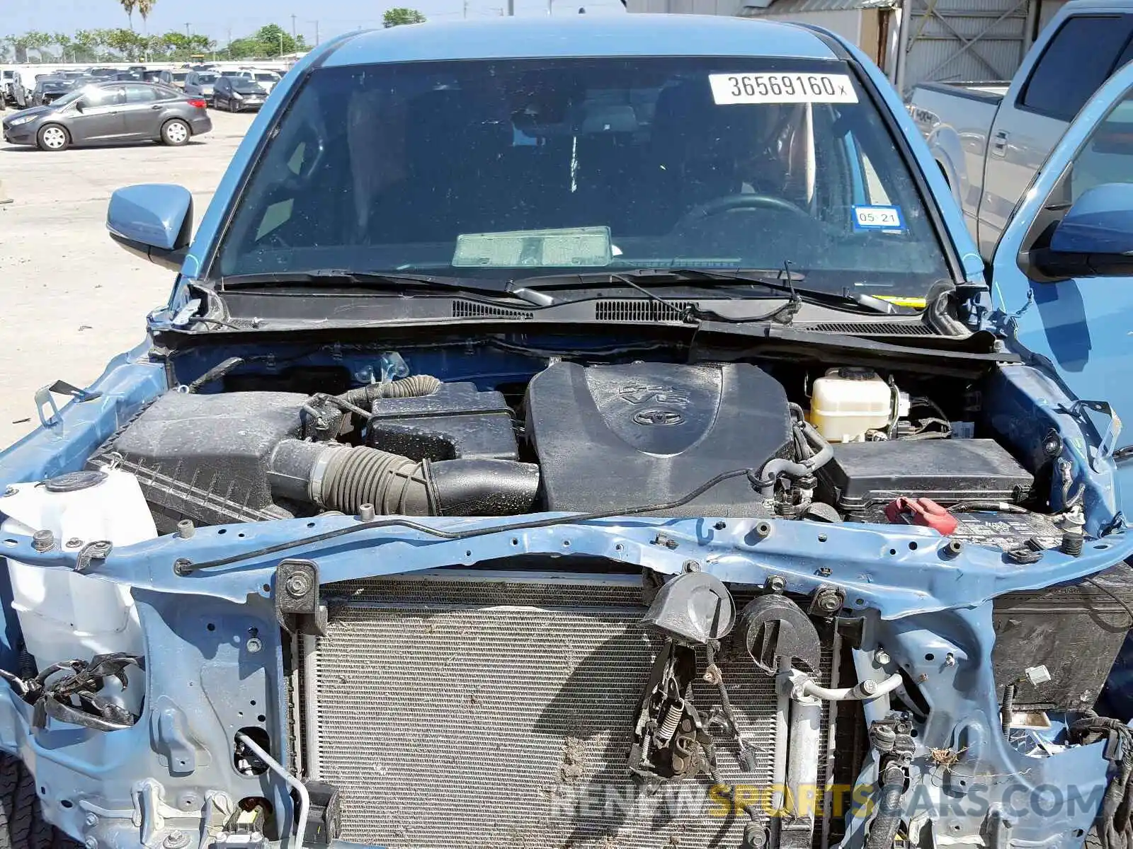 7 Photograph of a damaged car 5TFCZ5AN3KX193023 TOYOTA TACOMA 2019