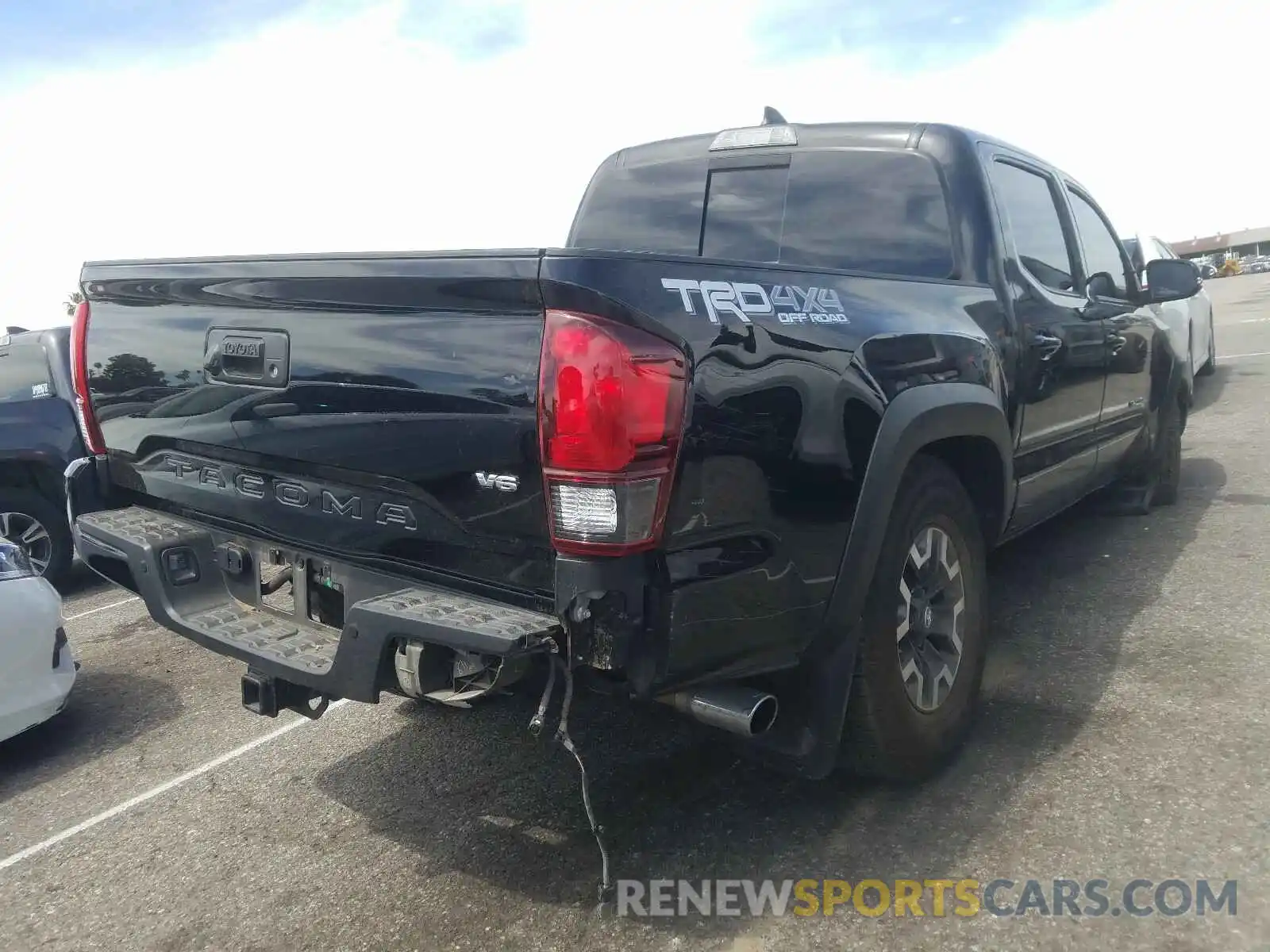 4 Photograph of a damaged car 5TFCZ5AN3KX193698 TOYOTA TACOMA 2019