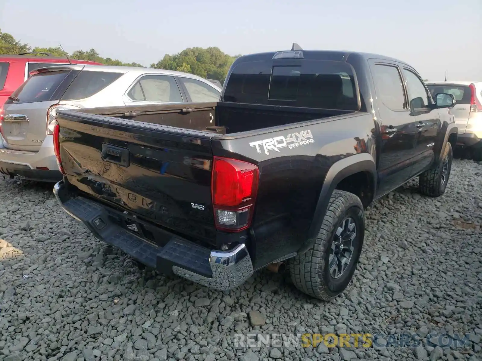 4 Photograph of a damaged car 5TFCZ5AN3KX194978 TOYOTA TACOMA 2019