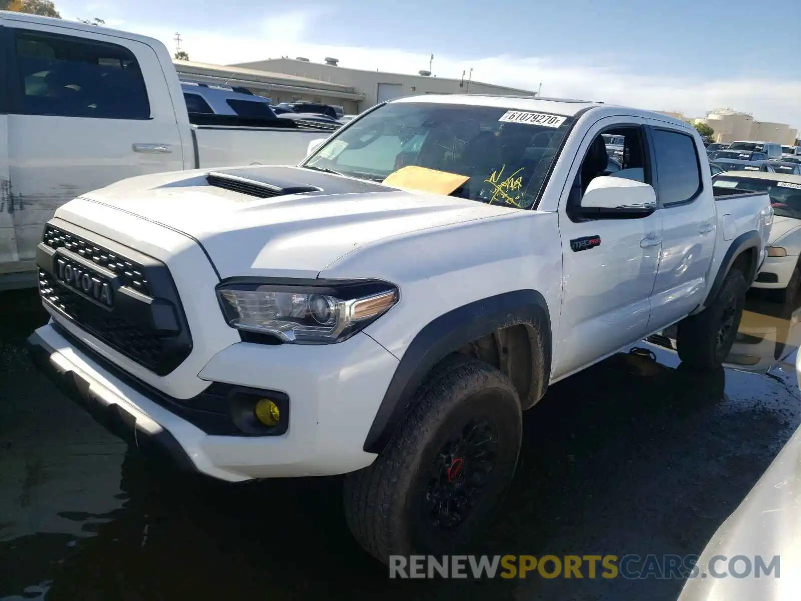 2 Photograph of a damaged car 5TFCZ5AN3KX197900 TOYOTA TACOMA 2019