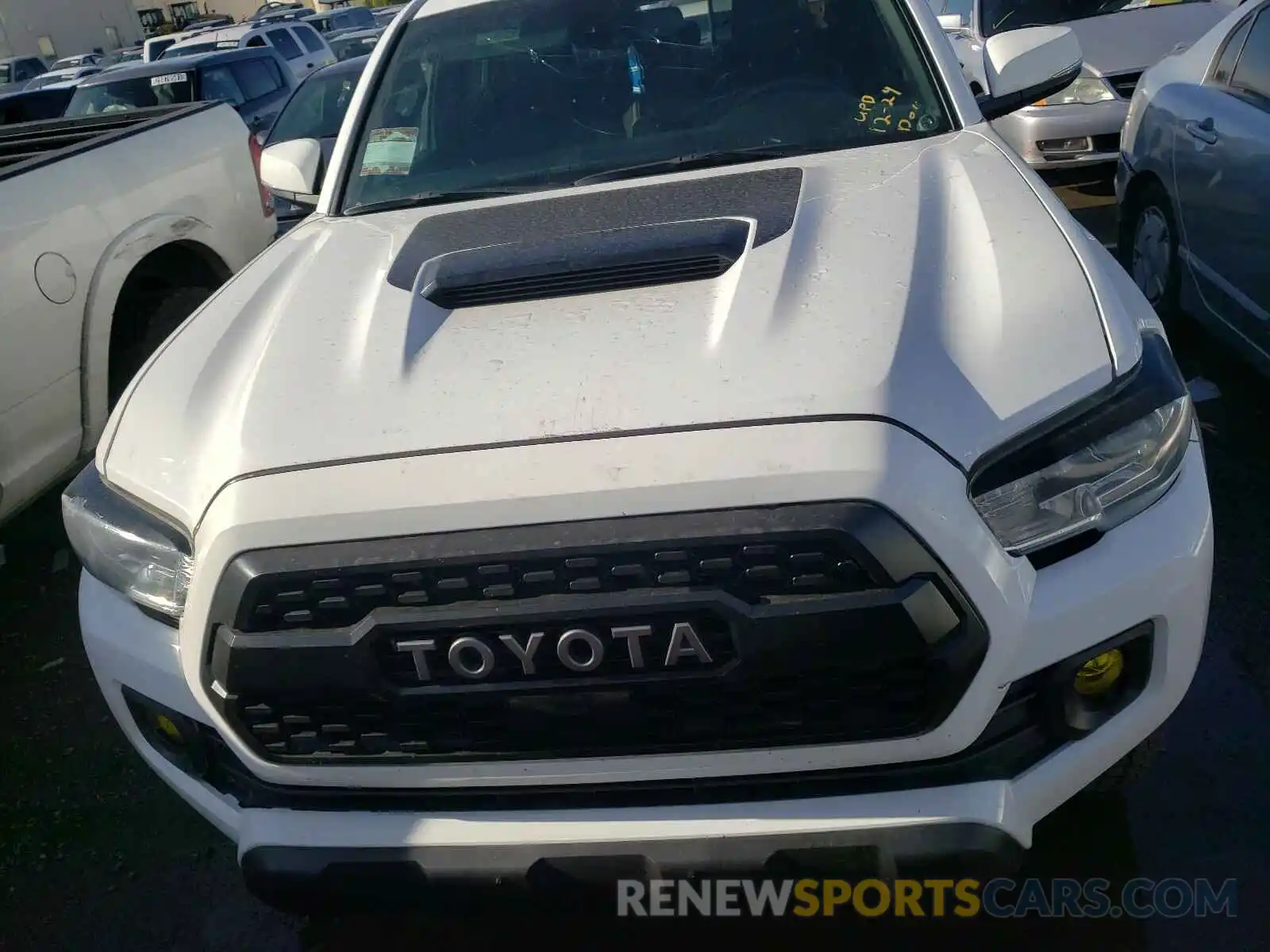 7 Photograph of a damaged car 5TFCZ5AN3KX197900 TOYOTA TACOMA 2019