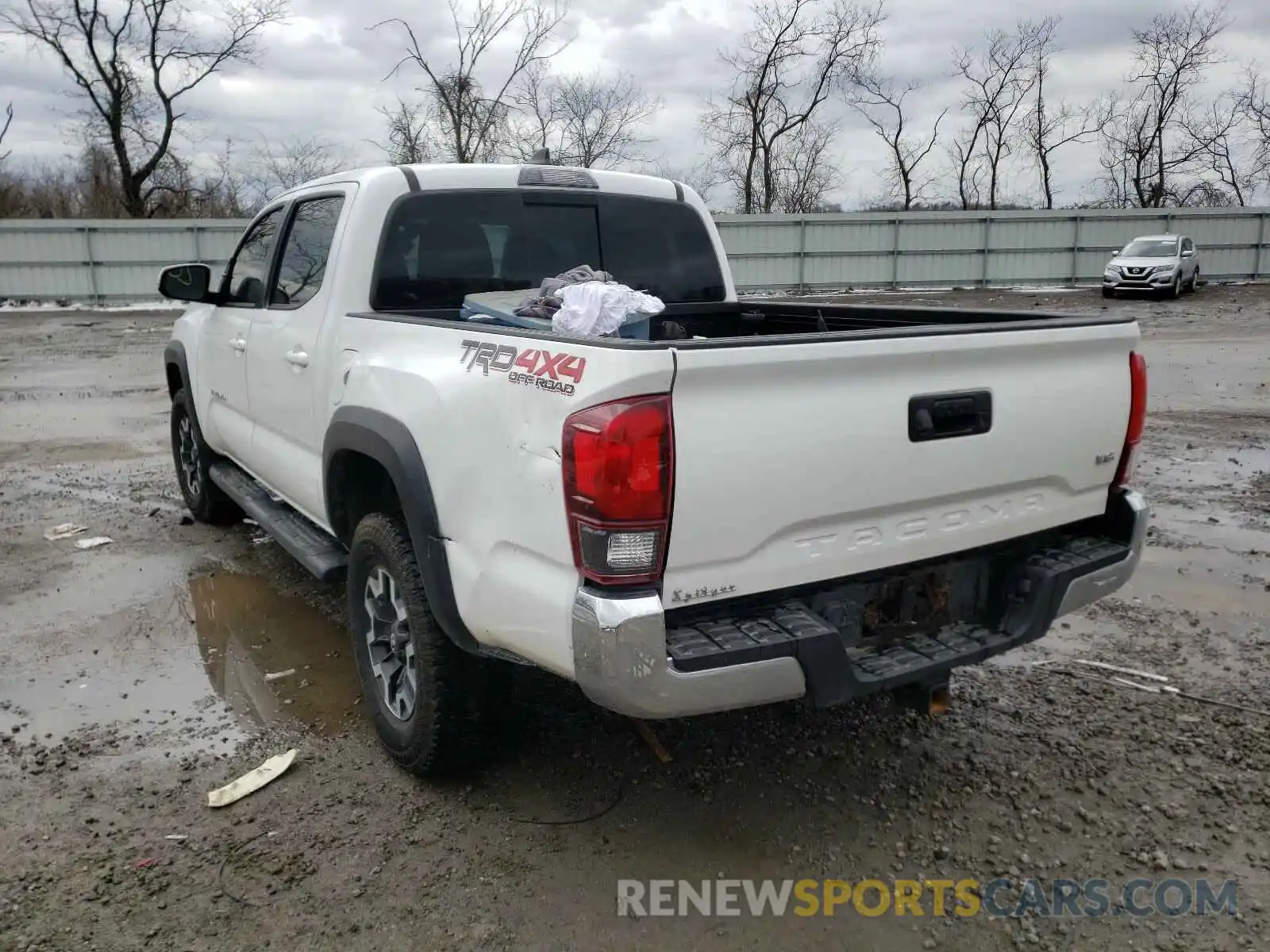 3 Photograph of a damaged car 5TFCZ5AN3KX198125 TOYOTA TACOMA 2019