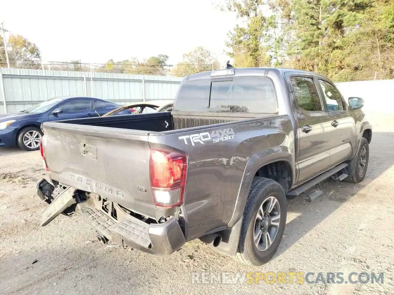 4 Photograph of a damaged car 5TFCZ5AN3KX199341 TOYOTA TACOMA 2019