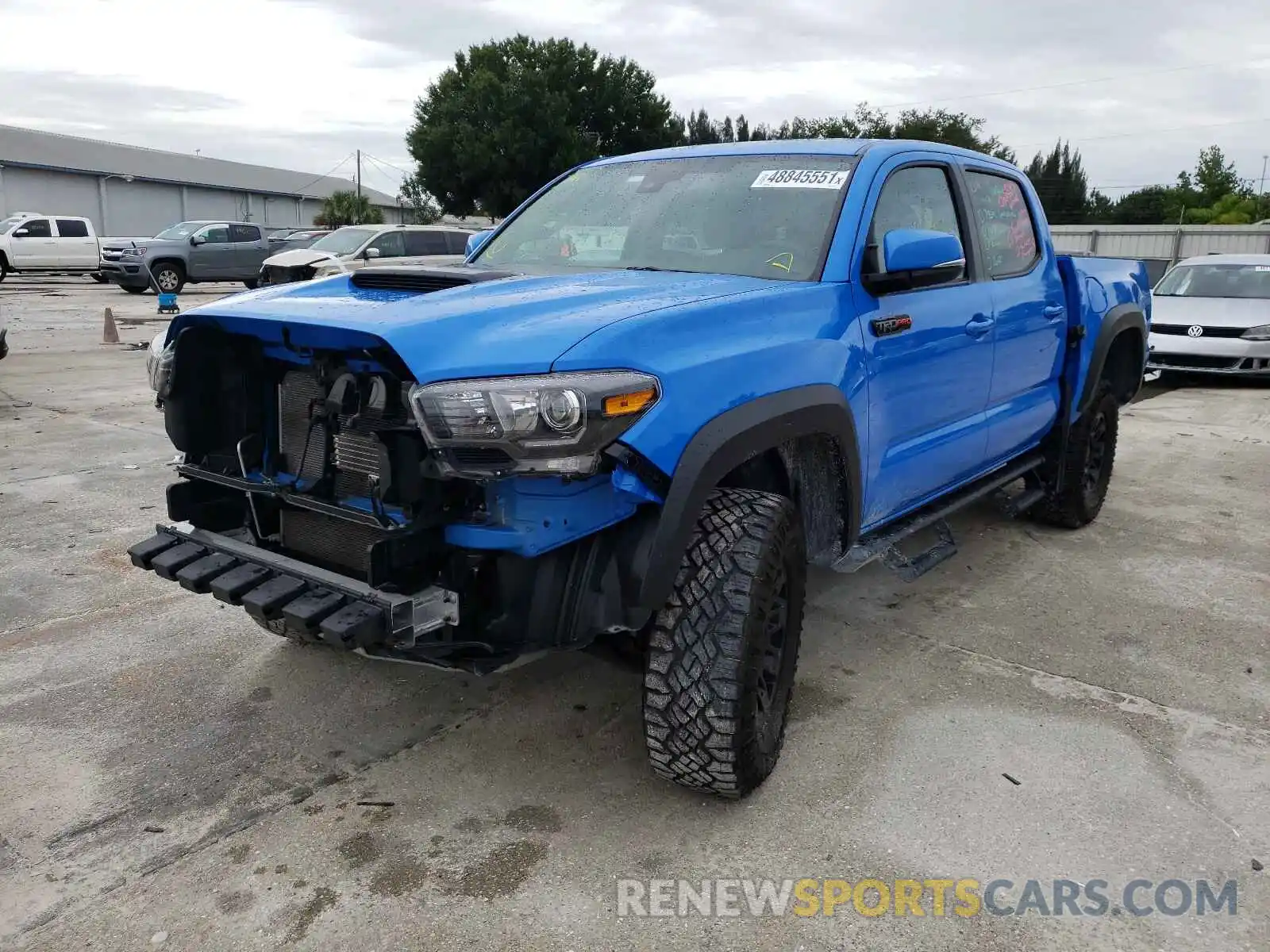 2 Photograph of a damaged car 5TFCZ5AN3KX201959 TOYOTA TACOMA 2019