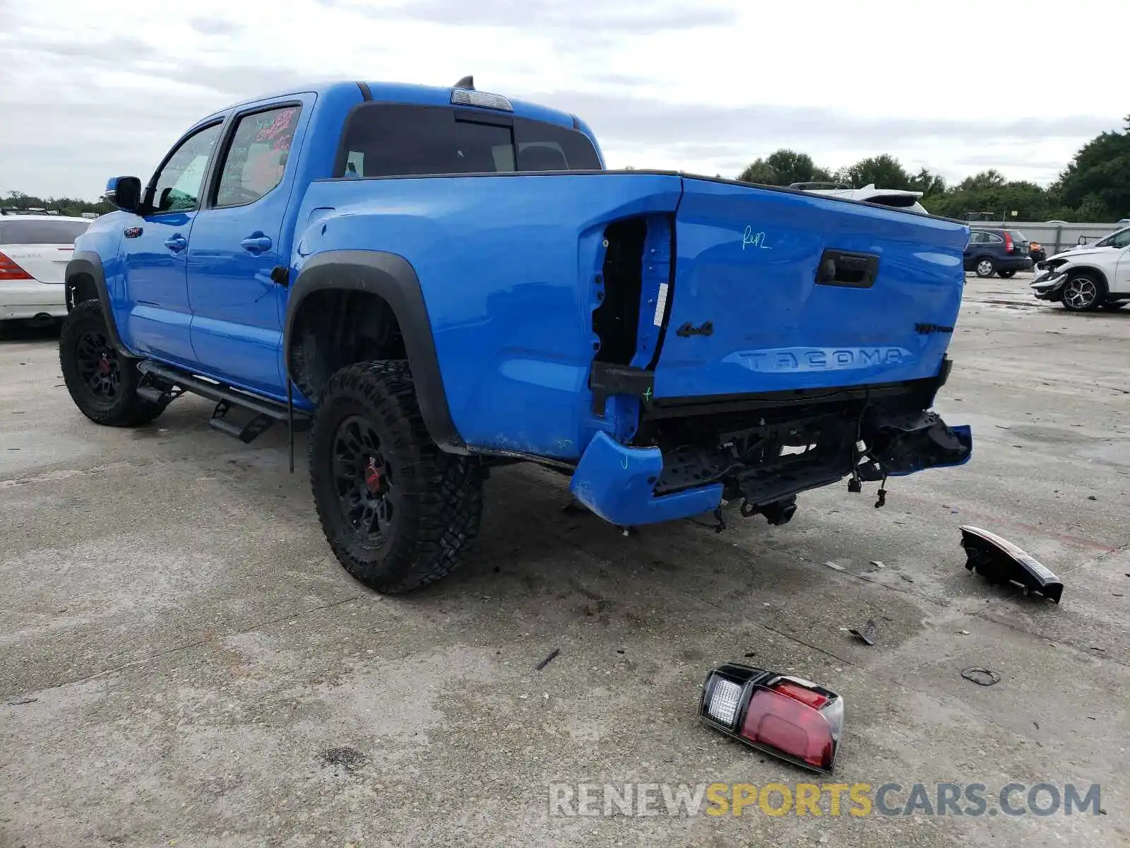 3 Photograph of a damaged car 5TFCZ5AN3KX201959 TOYOTA TACOMA 2019