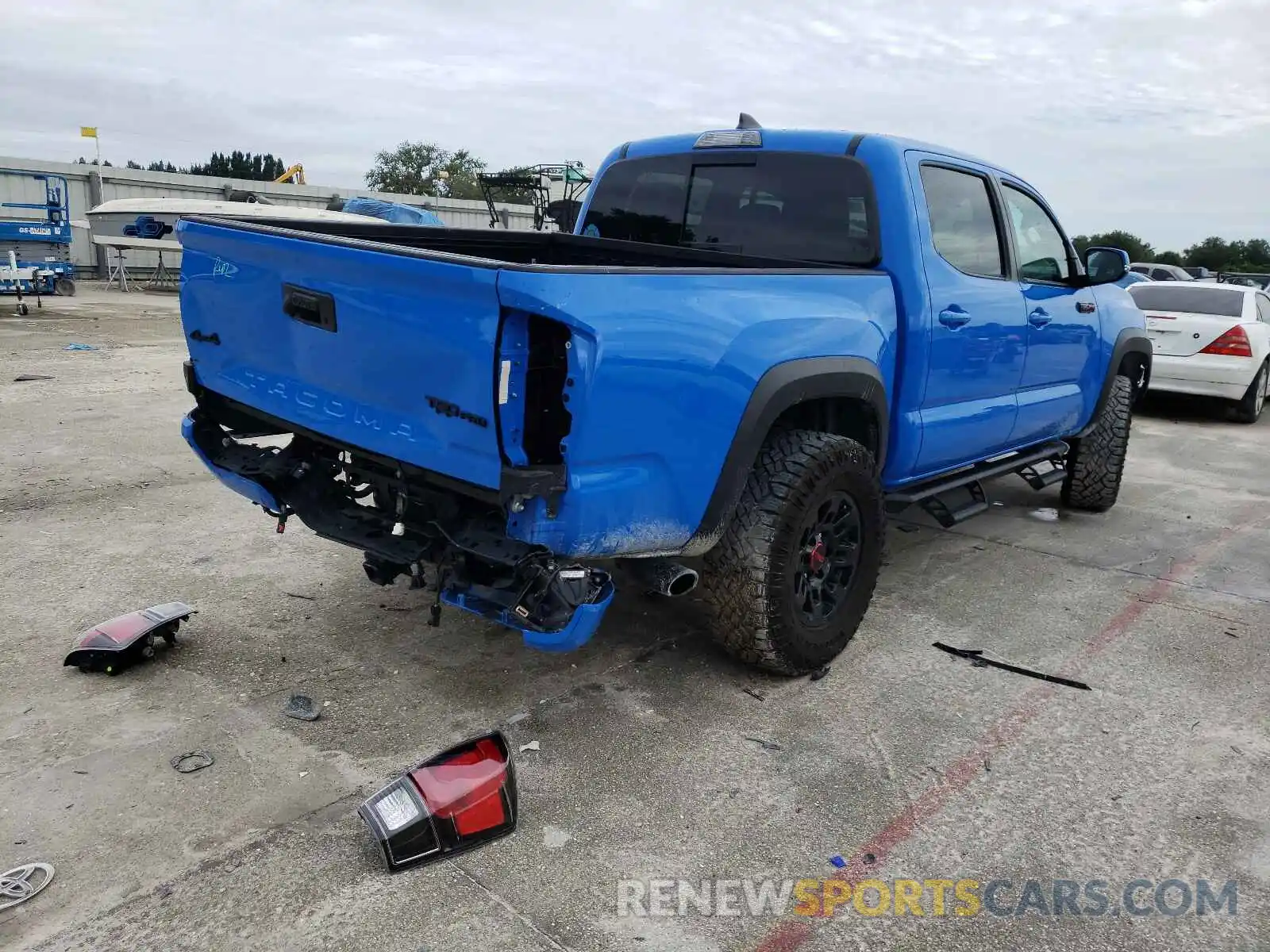 4 Photograph of a damaged car 5TFCZ5AN3KX201959 TOYOTA TACOMA 2019