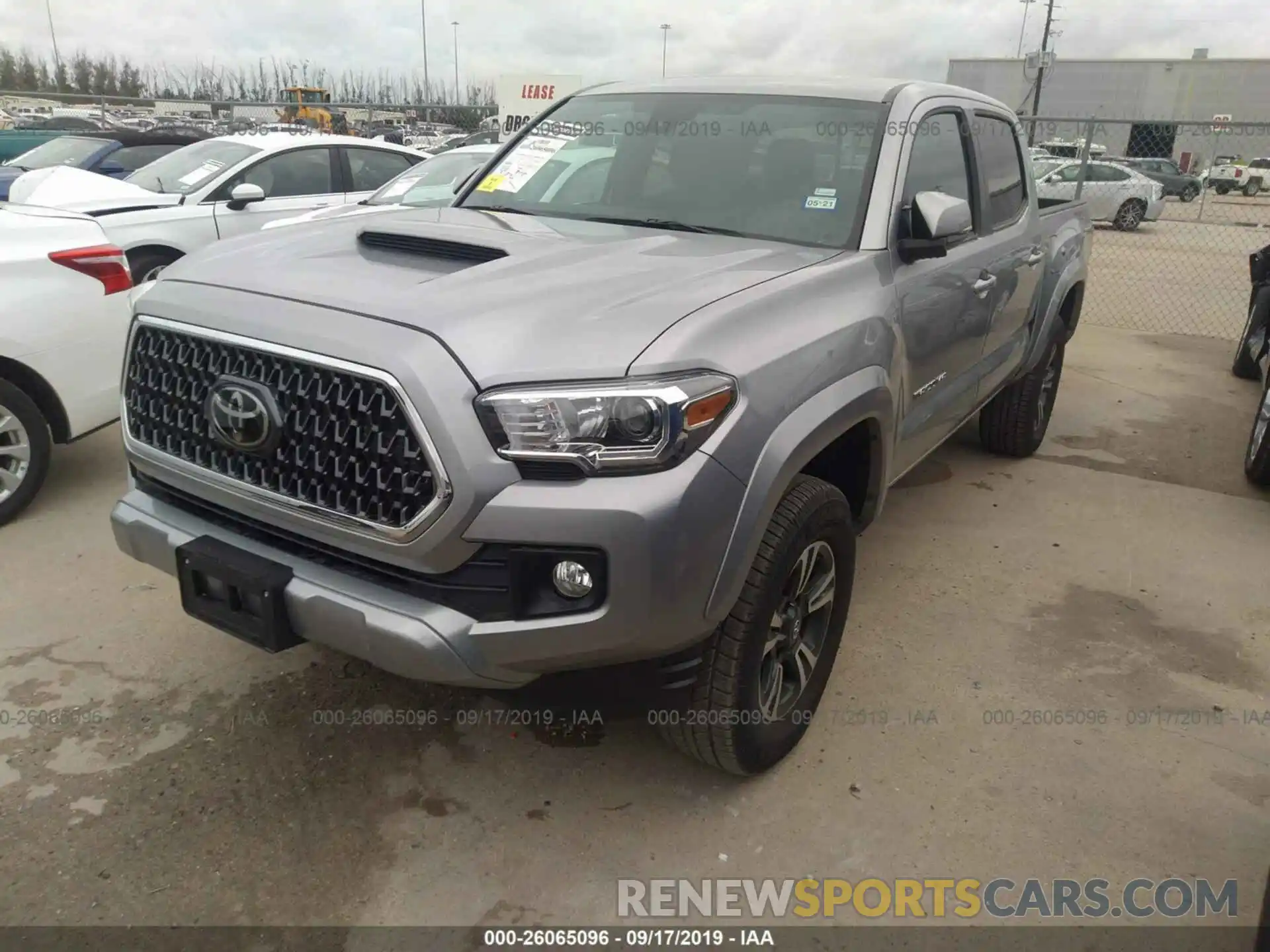 2 Photograph of a damaged car 5TFCZ5AN3KX203226 TOYOTA TACOMA 2019