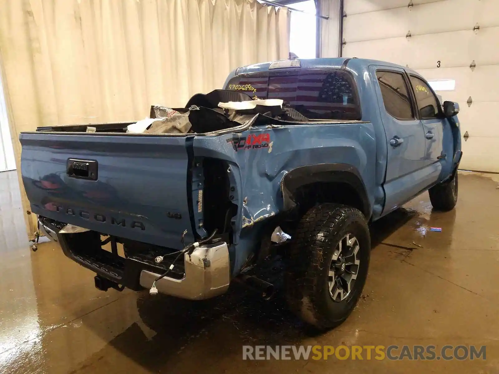 4 Photograph of a damaged car 5TFCZ5AN3KX204358 TOYOTA TACOMA 2019