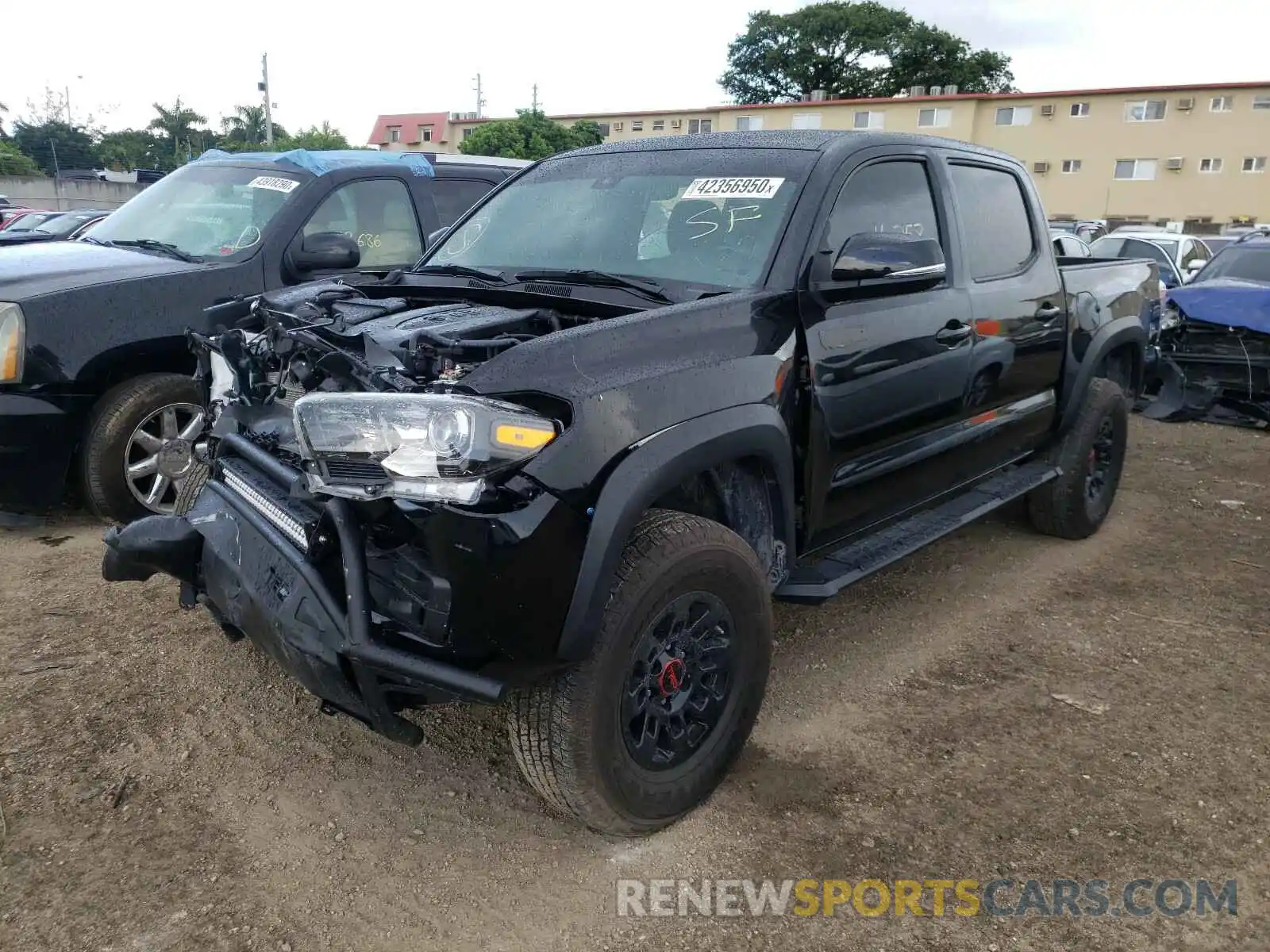 2 Photograph of a damaged car 5TFCZ5AN3KX206563 TOYOTA TACOMA 2019