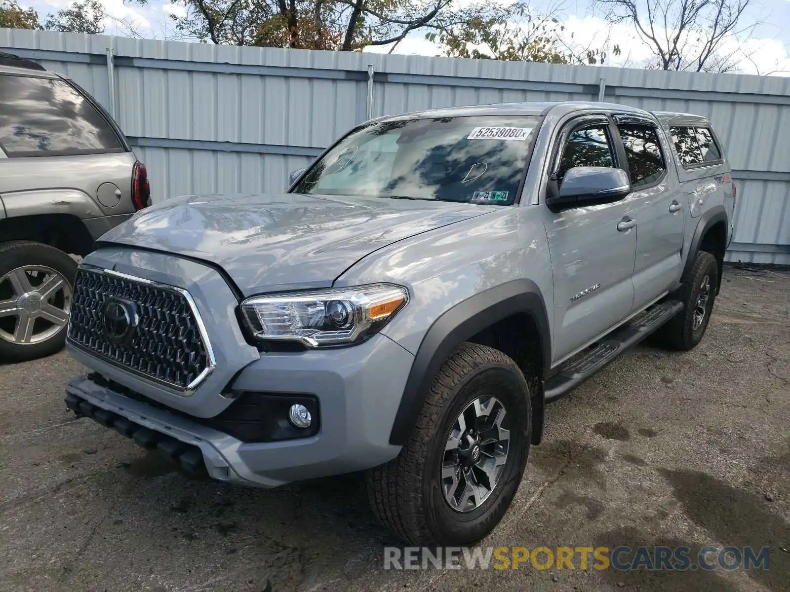 2 Photograph of a damaged car 5TFCZ5AN3KX208717 TOYOTA TACOMA 2019