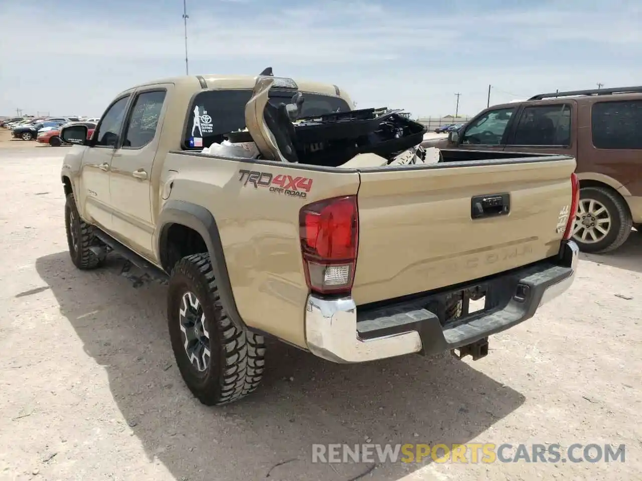 3 Photograph of a damaged car 5TFCZ5AN4KX166140 TOYOTA TACOMA 2019