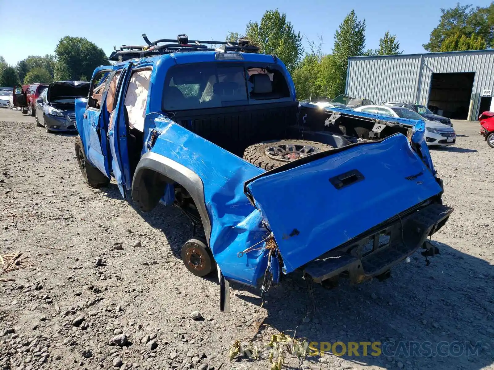 3 Photograph of a damaged car 5TFCZ5AN4KX166459 TOYOTA TACOMA 2019