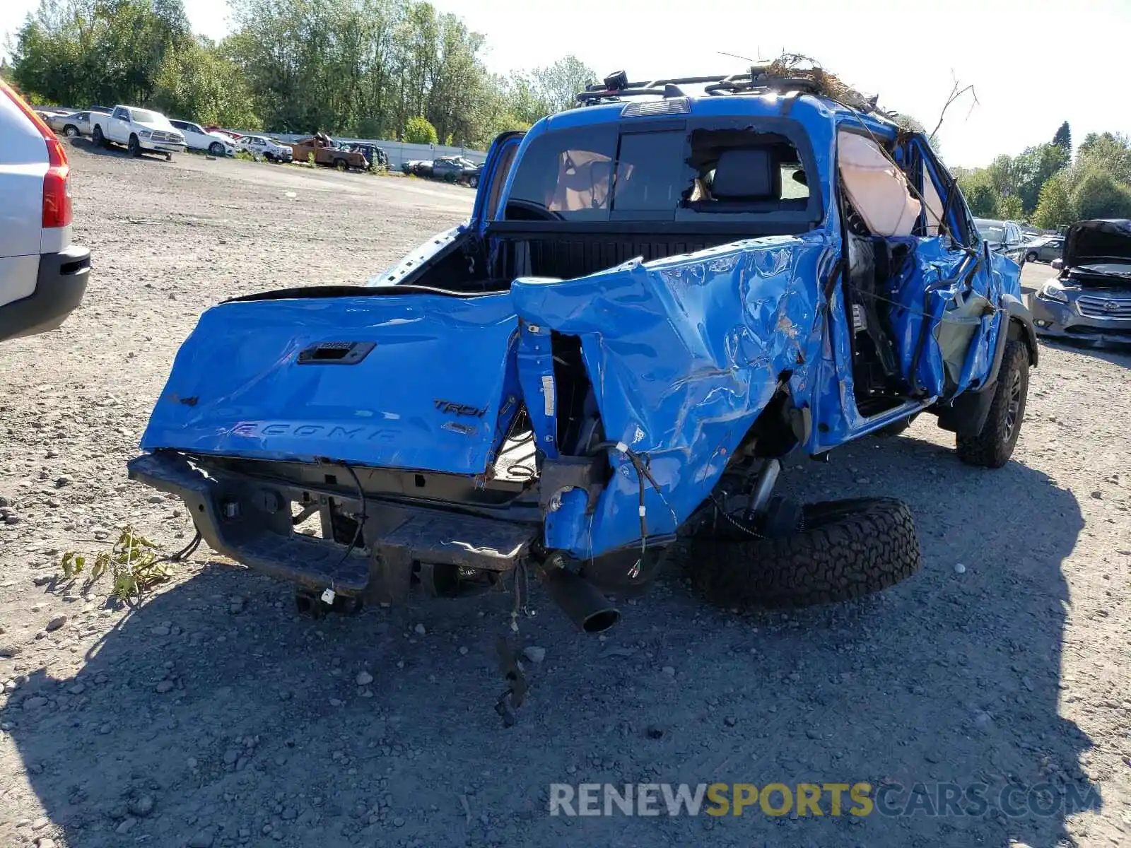 4 Photograph of a damaged car 5TFCZ5AN4KX166459 TOYOTA TACOMA 2019