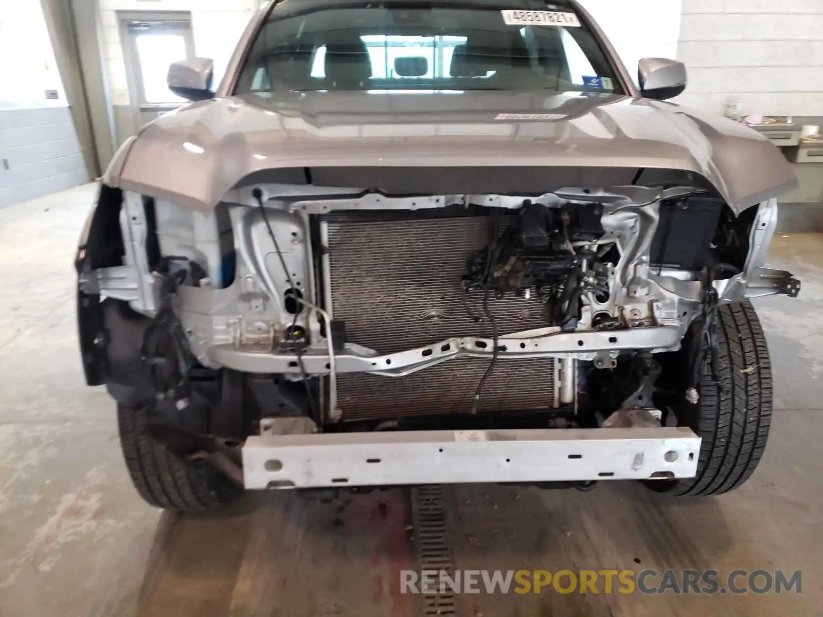 9 Photograph of a damaged car 5TFCZ5AN4KX169460 TOYOTA TACOMA 2019