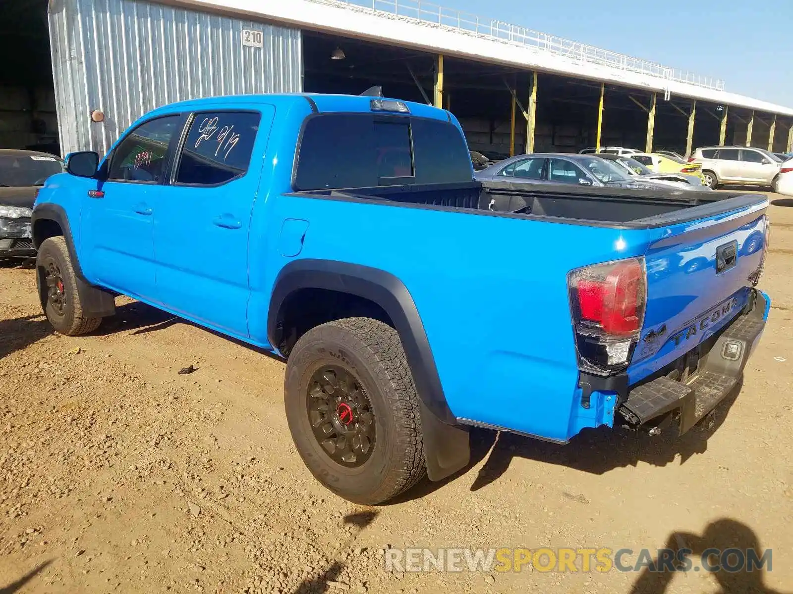 3 Photograph of a damaged car 5TFCZ5AN4KX169944 TOYOTA TACOMA 2019